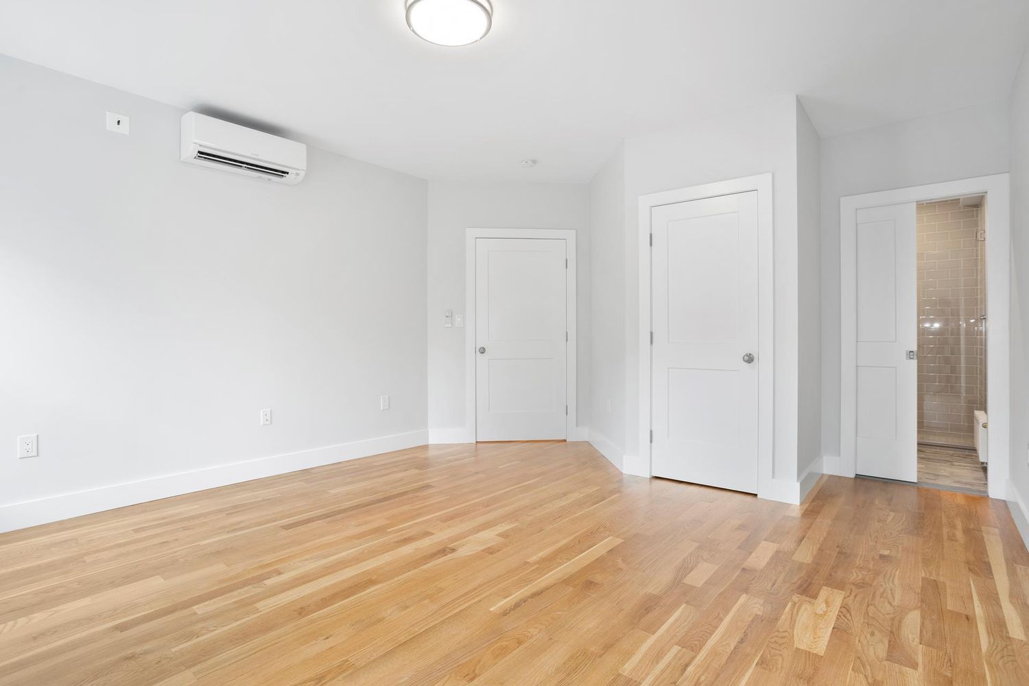 136 Union Street, Unit 2 Brooklyn, NY 11231 - Photo 5 of 9 a view of empty room with wooden floor