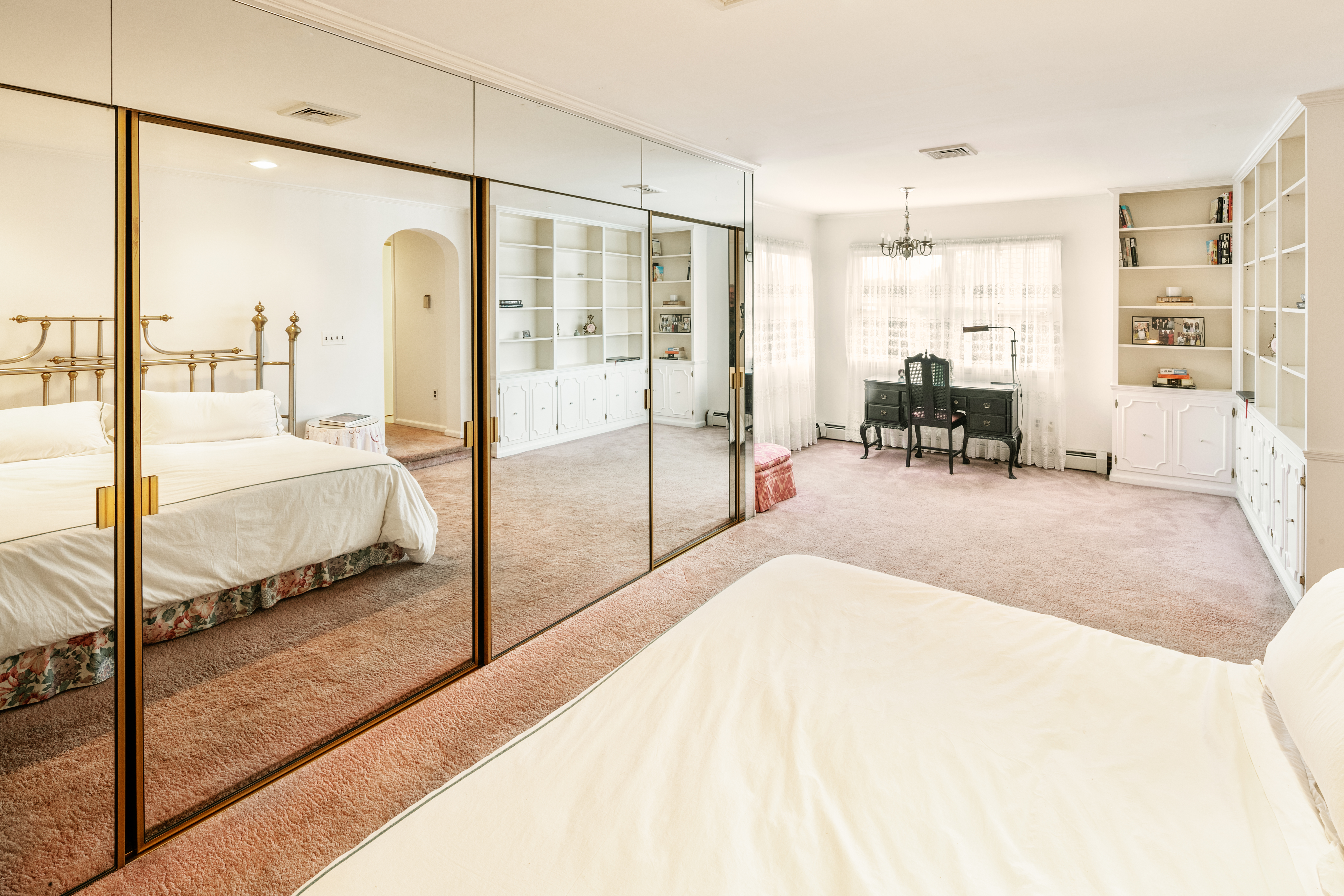 91 81st Street Brooklyn, NY 11209 - Photo 15 of 19 a bedroom with a bed and a table