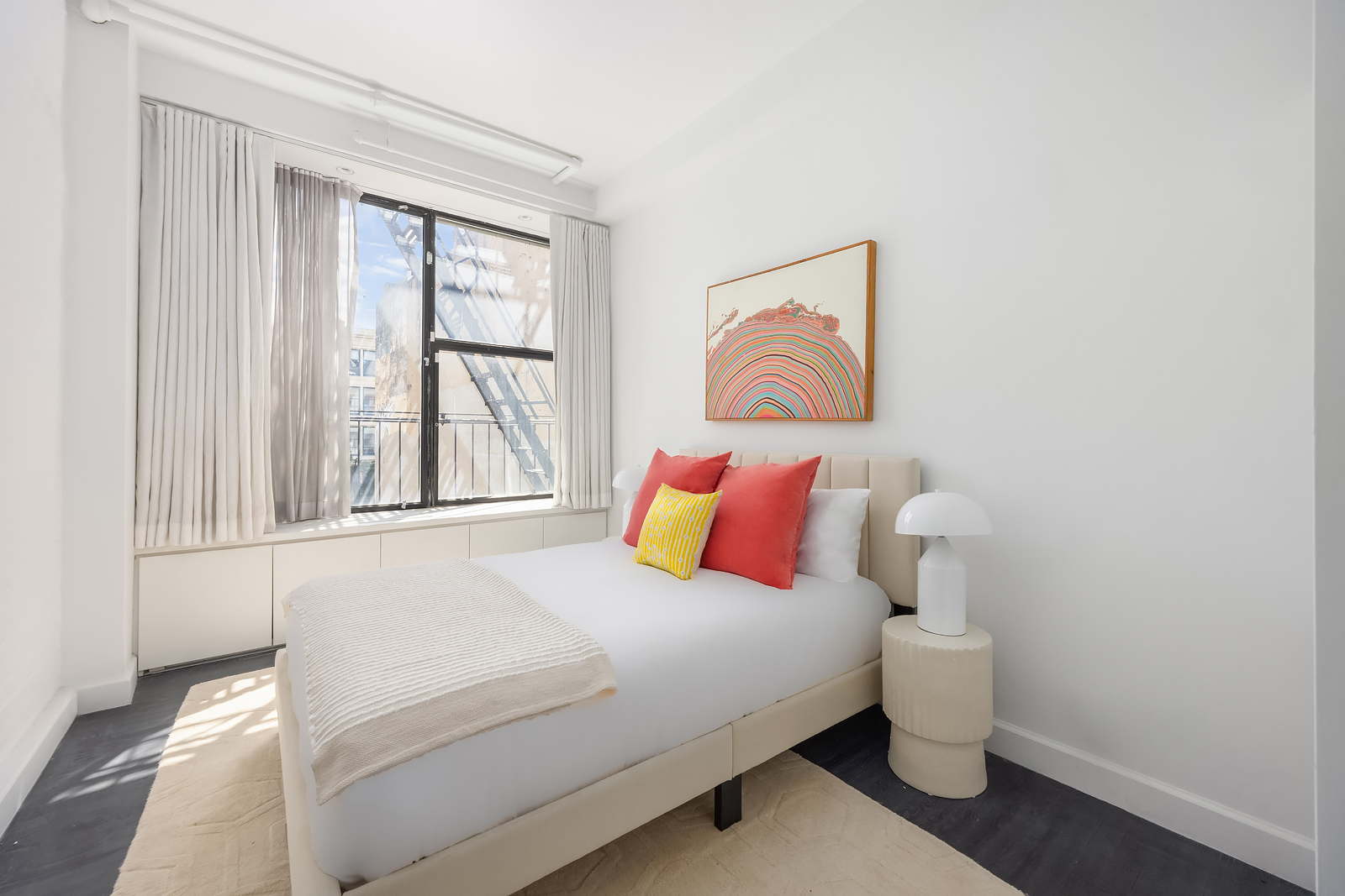 36 West 15th Street, Unit 4 Manhattan, NY 10011 - Photo 19 of 21 a bedroom with a bed and a window