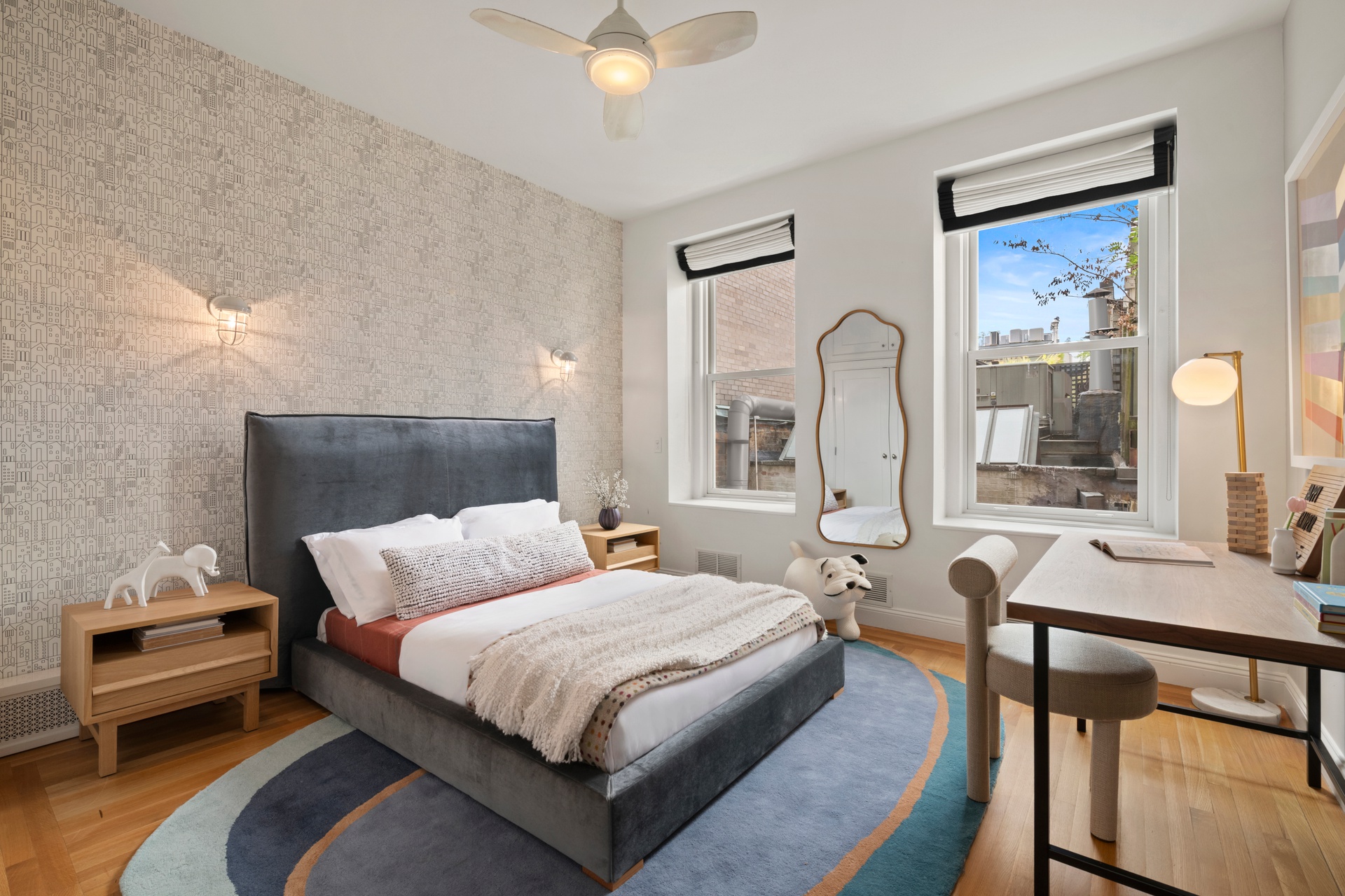 30 West 13th Street, Unit 4C Manhattan, NY 10011 - Photo 17 of 22 a bedroom with bed and a large window