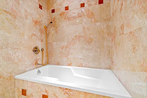 a bathroom with a bathtub