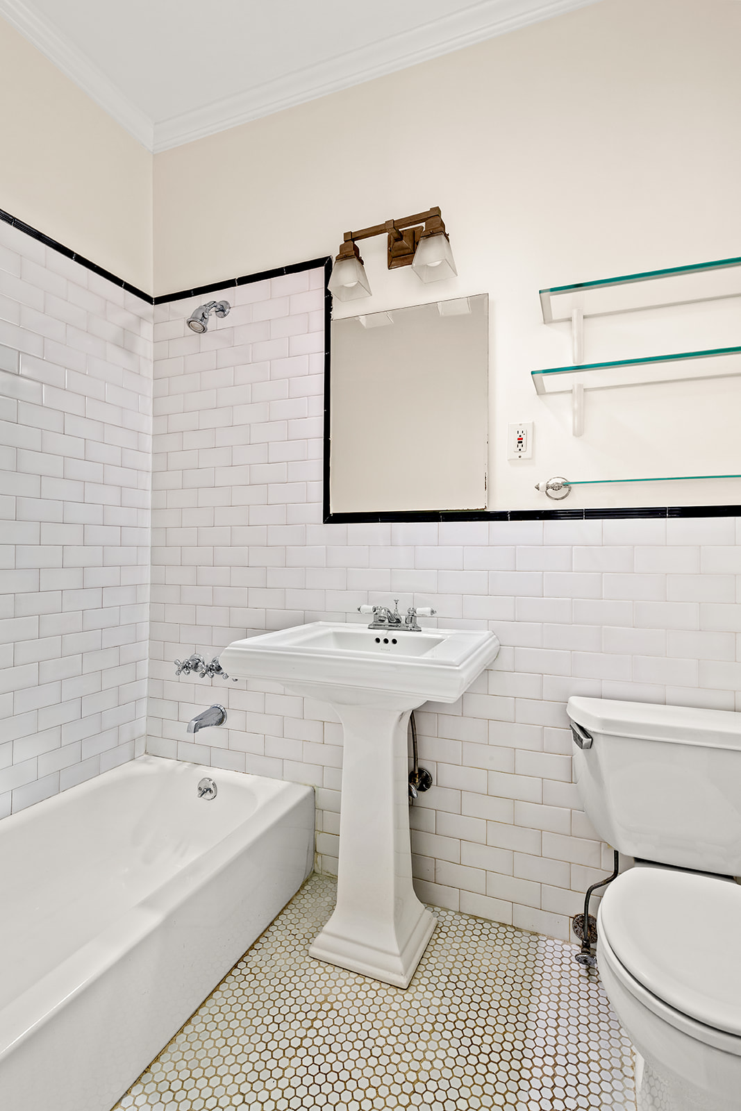 689 Fort Washington Avenue, Unit 1AA Manhattan, NY 10040 - Photo 10 of 13 a bathroom with a sink a toilet and a bathtub
