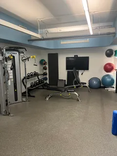 a view of a room with gym equipment