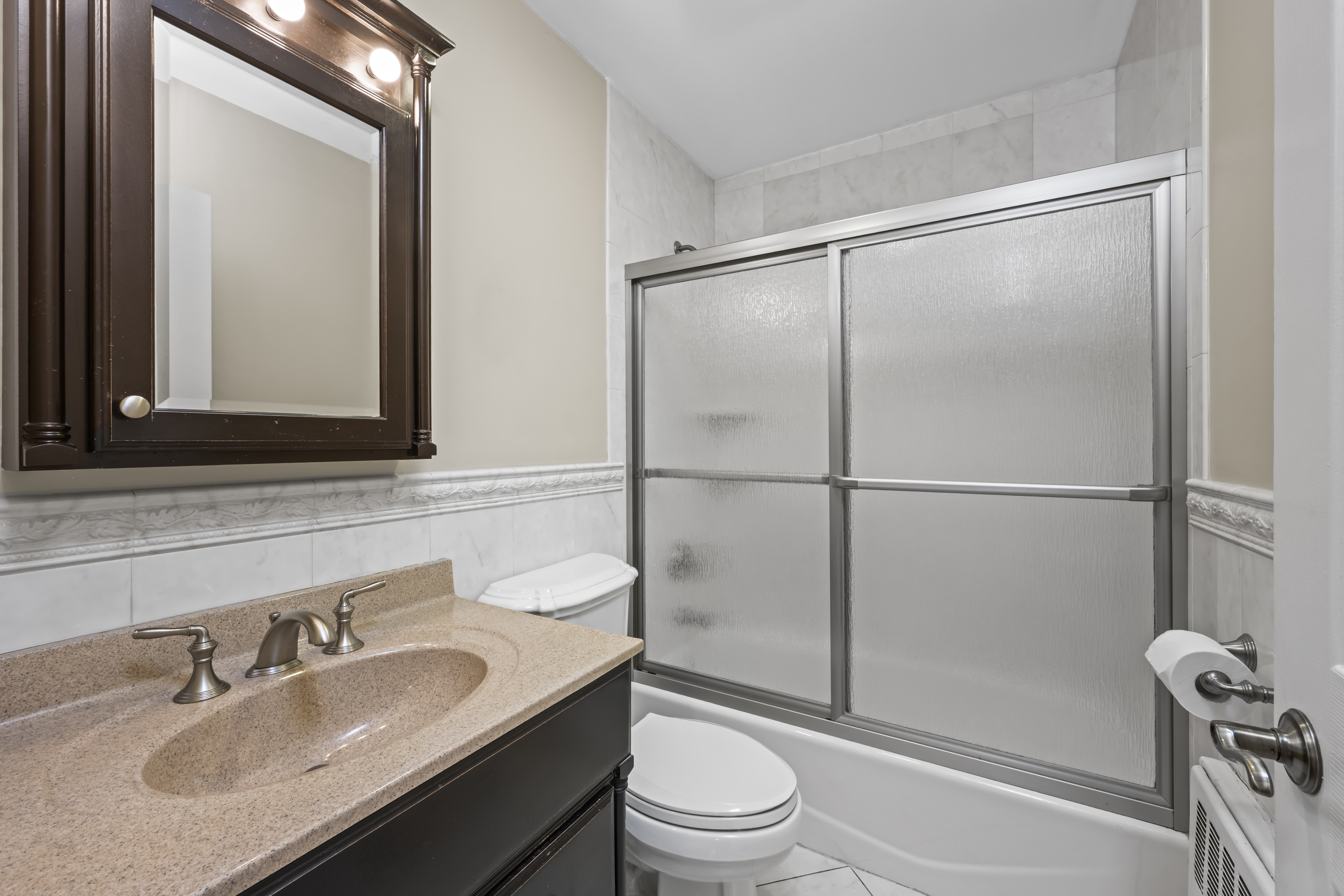 522 Stewart Avenue Staten Island, NY 10314 - Photo 14 of 33 a bathroom with a sink toilet and shower