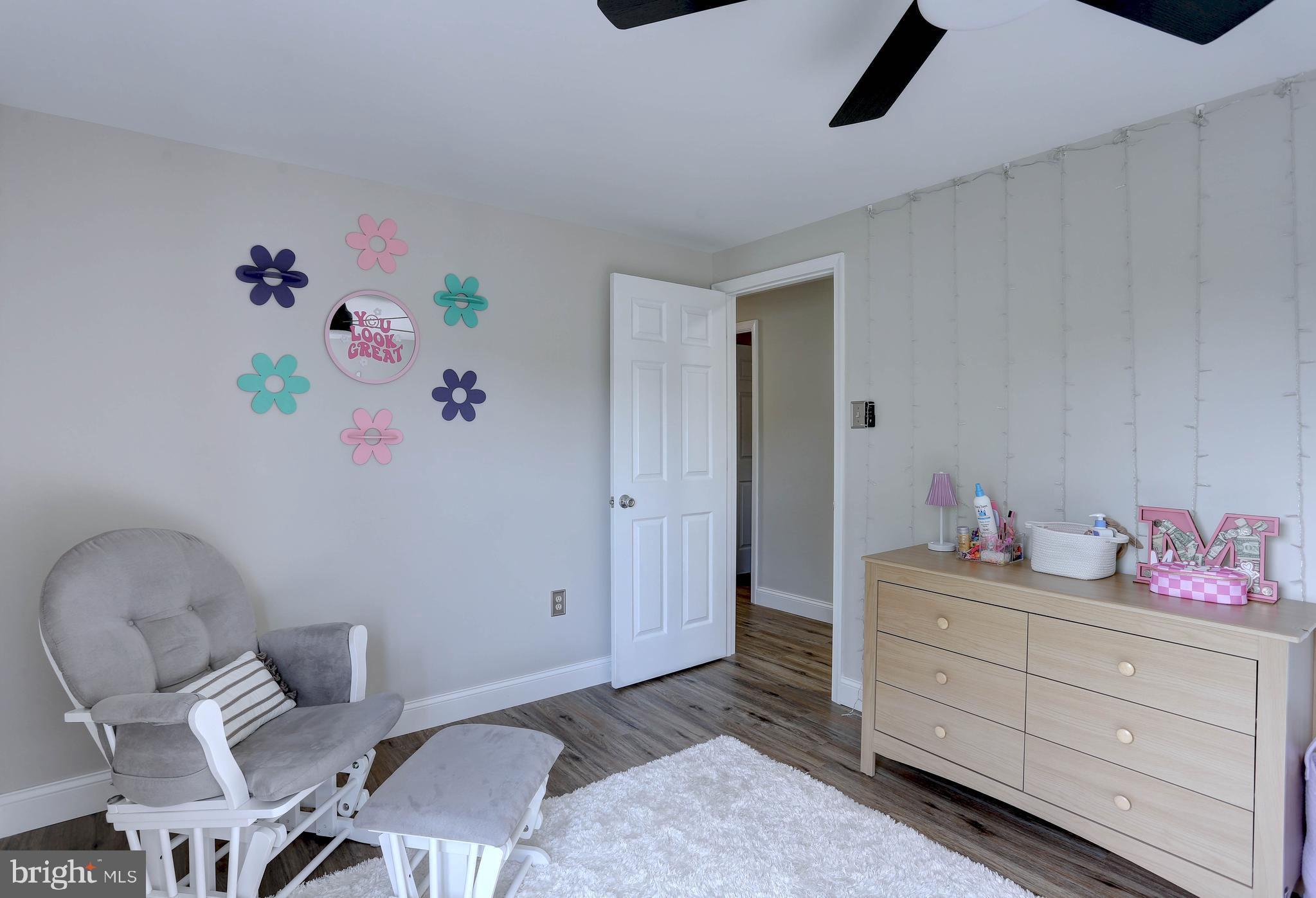 6257 Fairbourne Court Hanover, MD 21076 - Photo 30 of 47 a bedroom with a bed and furniture