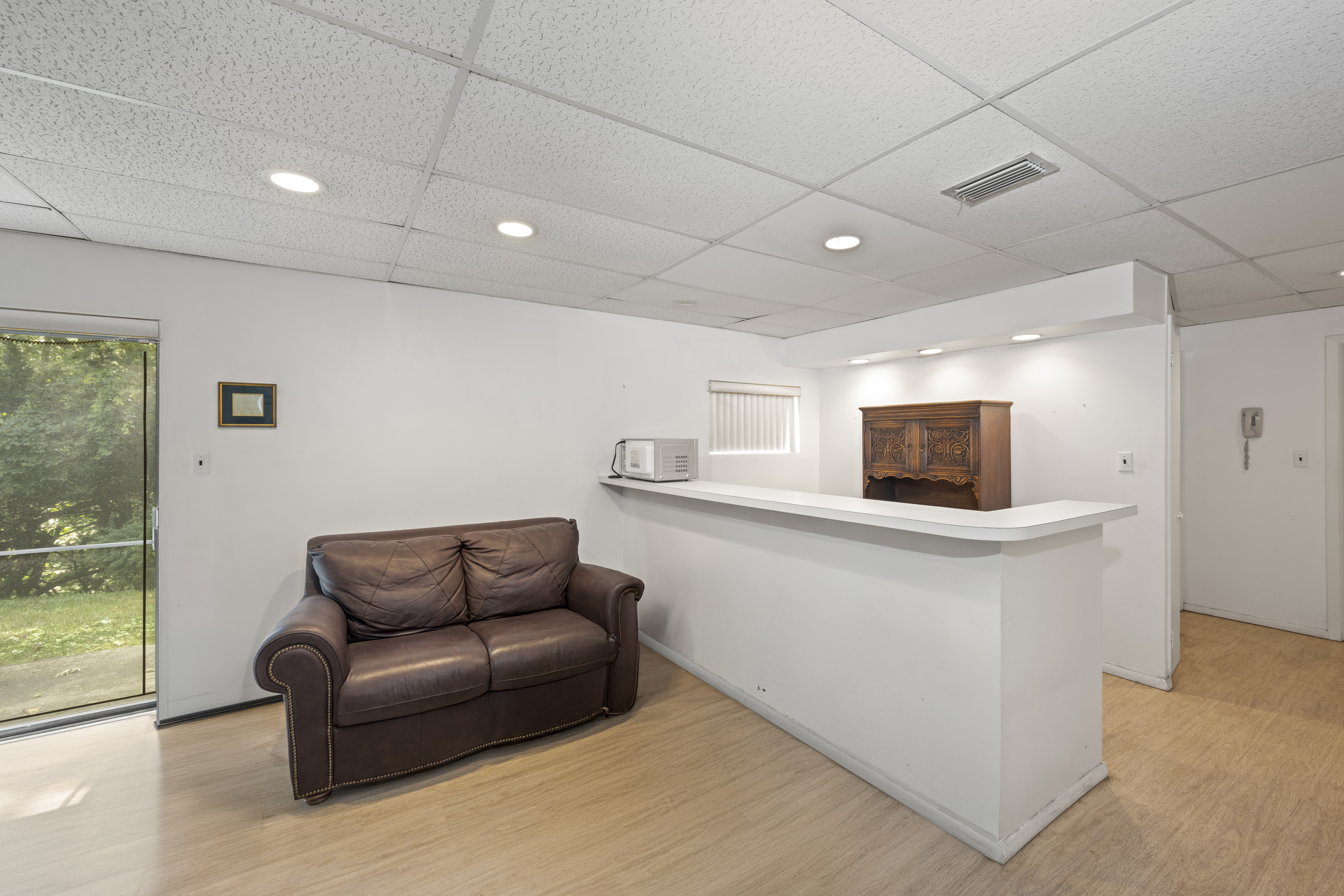 420 Ocean Terrace Staten Island, NY 10301 - Photo 24 of 28 a living room with furniture and a flat screen tv