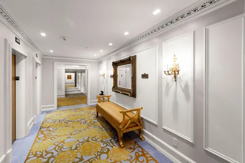 a view of a hall with many windows