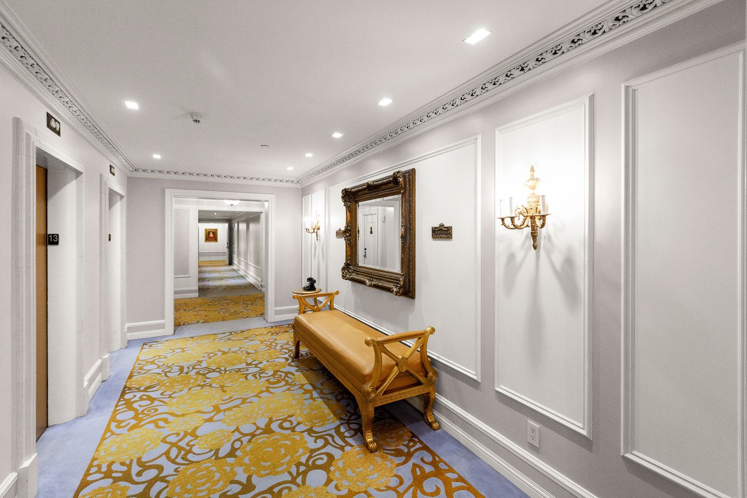 1 Central Park South, Unit 1336 Manhattan, NY 10019 - Photo 8 of 21 a room with wooden floor and furniture