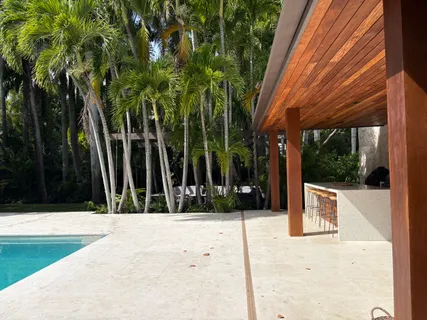 a view of swimming pool with a backyard