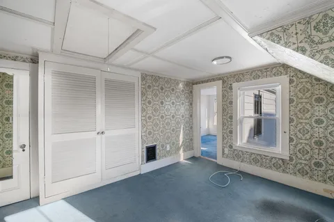 a bathroom with a bathtub a toilet and a shower