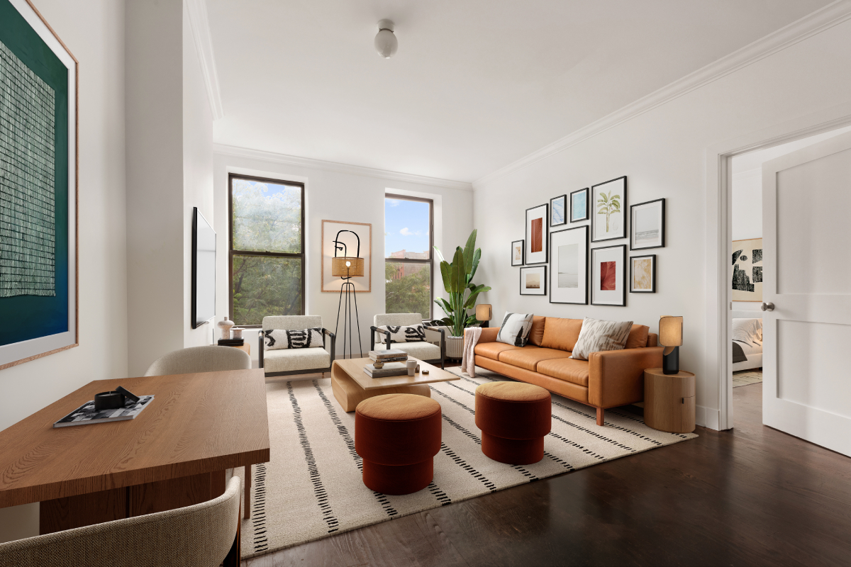 a living room with fireplace furniture and a large window
