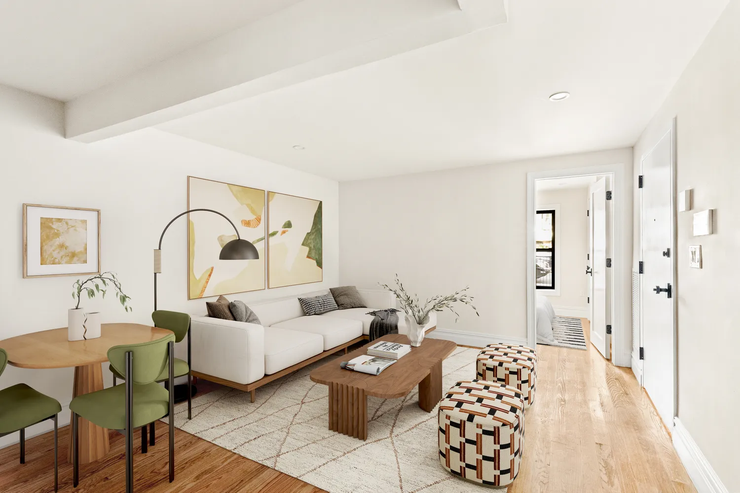 a living room with furniture and wooden floor