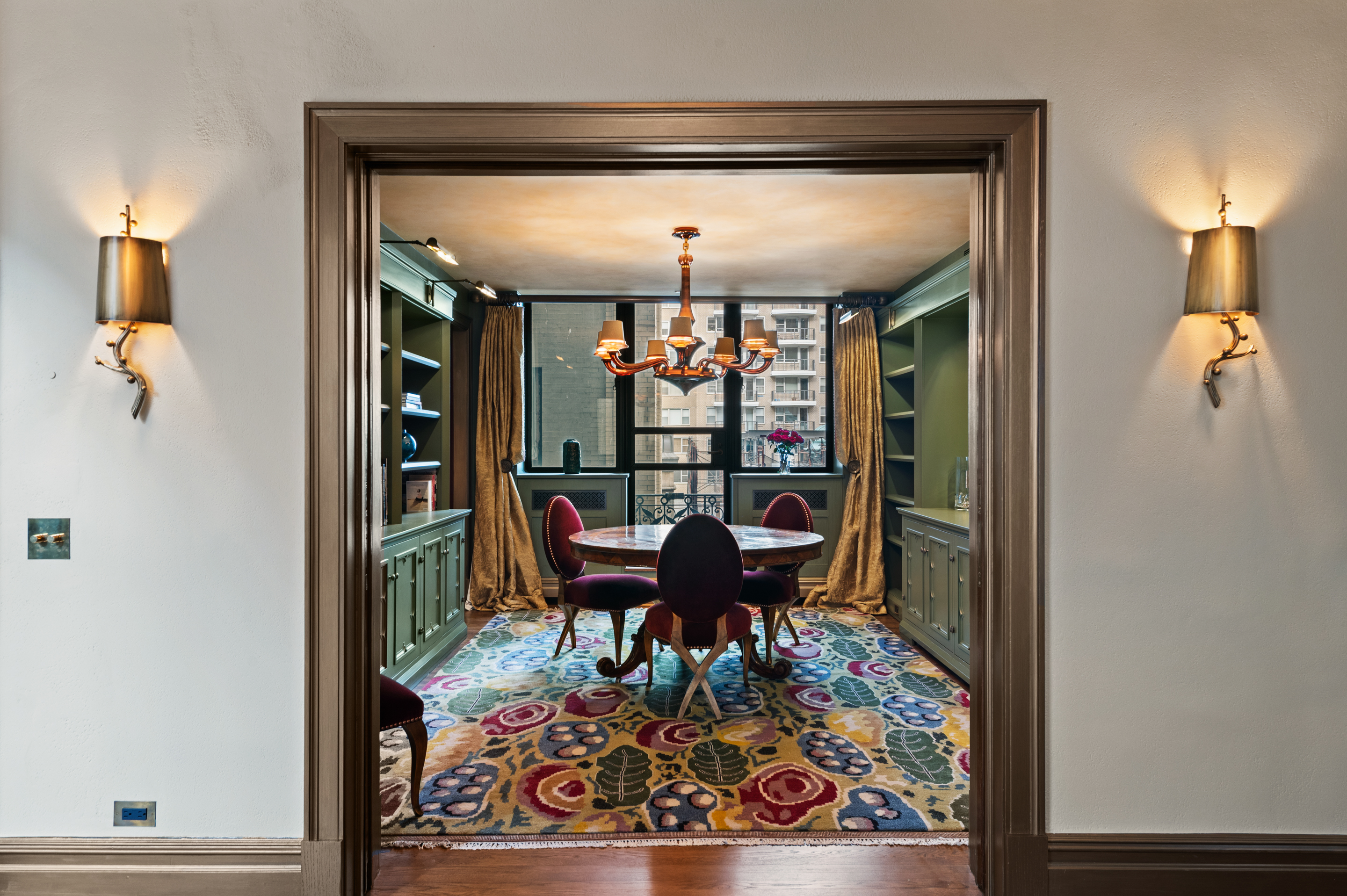 1 West 67th Street, Unit 616/6E Manhattan, NY 10023 - Photo 9 of 27 a view of a hallway with furniture and a window
