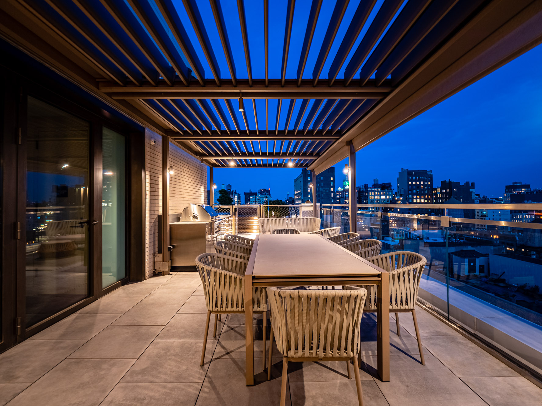 55 West 17th Street, Unit PH Manhattan, NY 10011 - Photo 22 of 36 a patio with a table and chairs