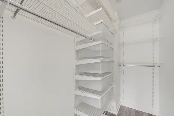 a view of an empty walk in closet