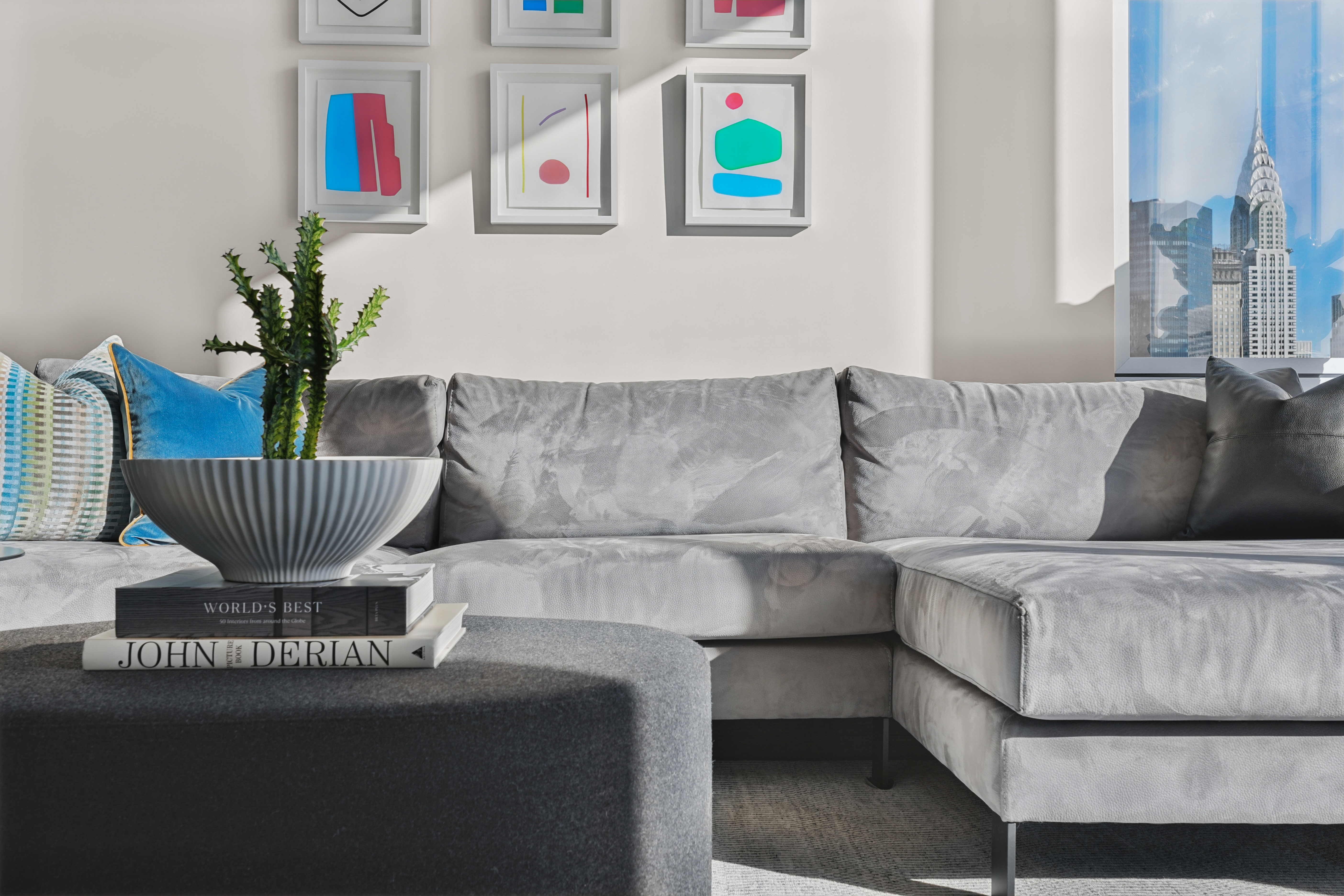 172 Madison Avenue, Unit 24B Manhattan, NY 10016 - Photo 2 of 16 a living room with furniture and a couch