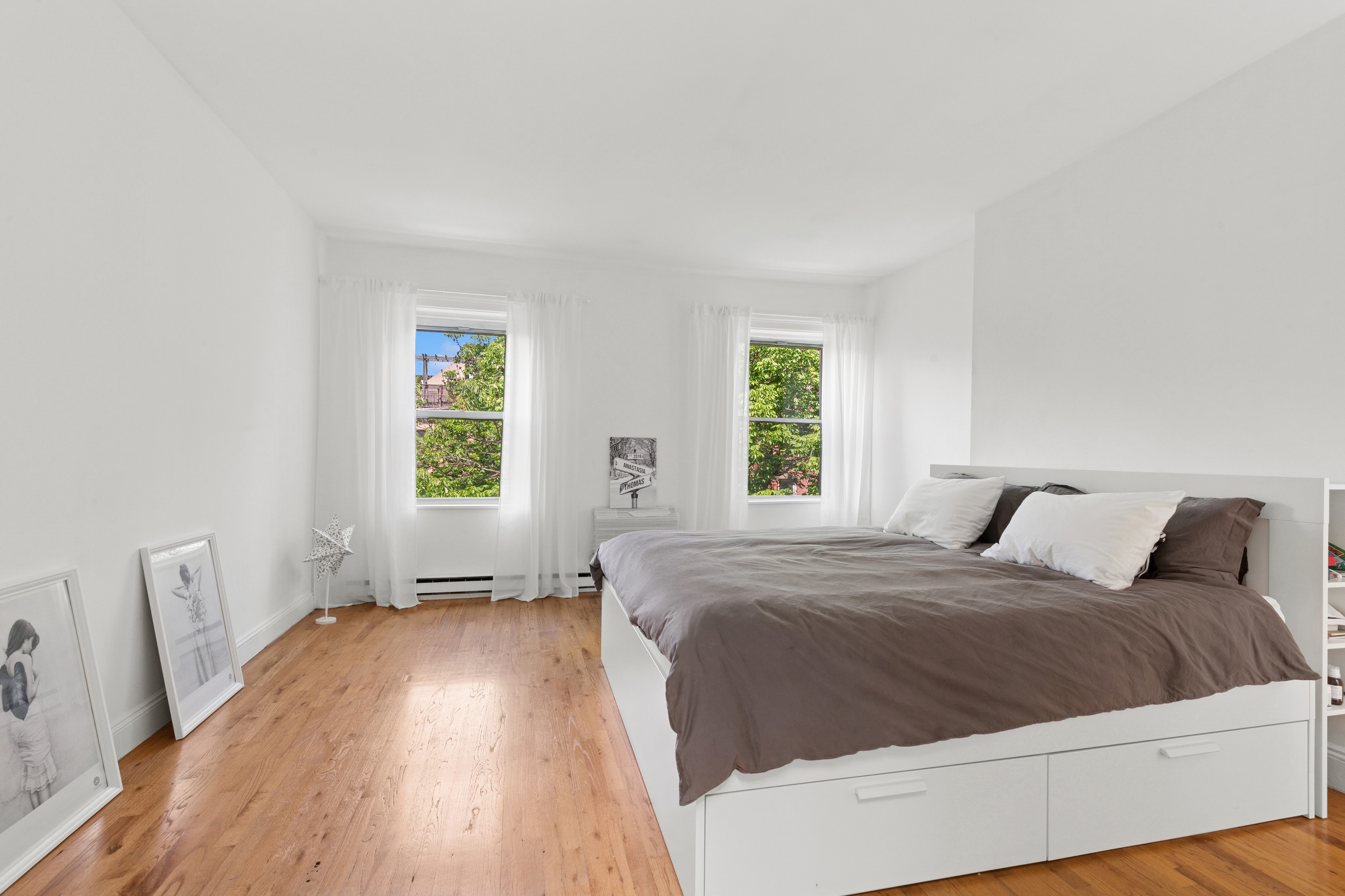 53 West 82nd Street, Unit 2 Manhattan, NY 10024 - Photo 4 of 10 a bedroom with a bed and a window