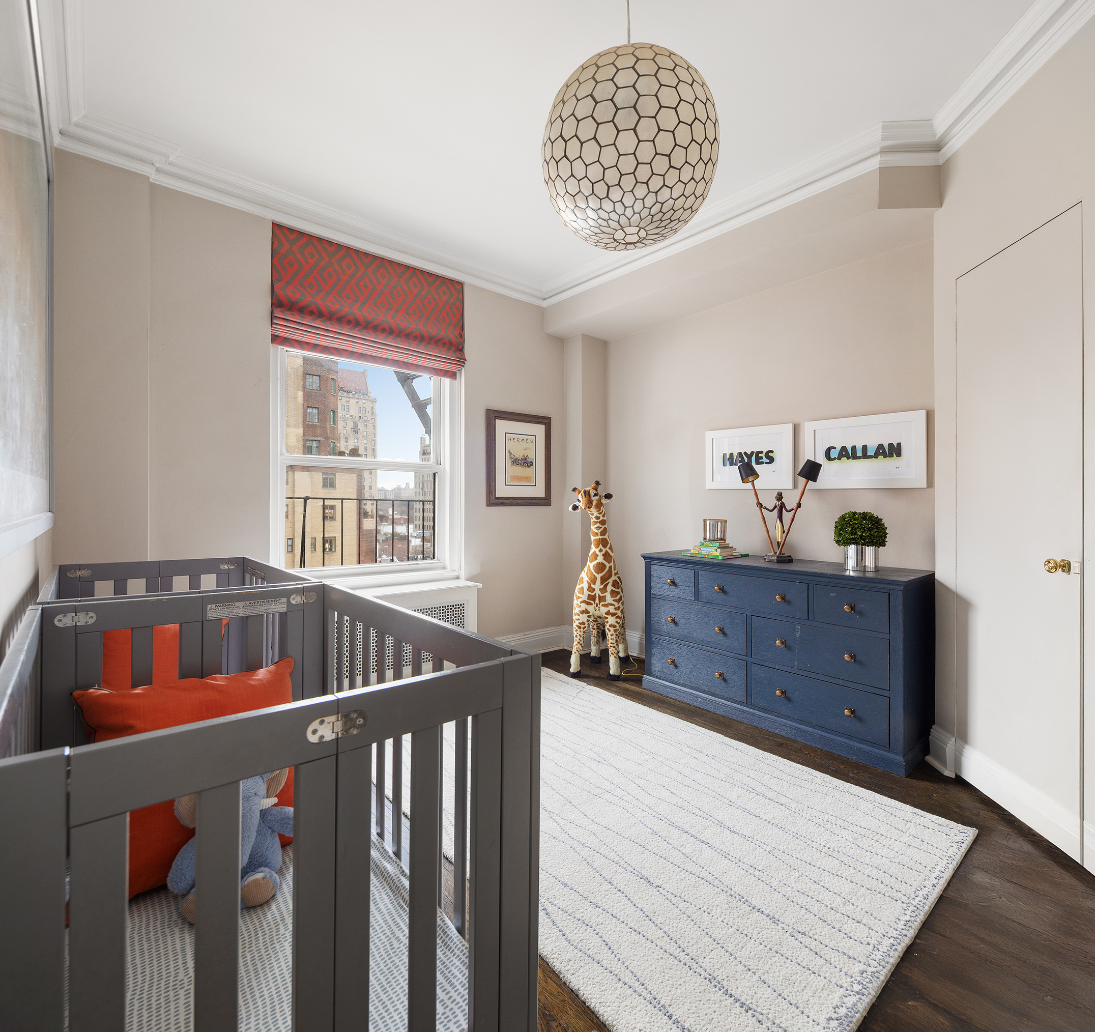 570 Park Avenue, Unit 10D Manhattan, NY 10065 - Photo 12 of 17 a bedroom with furniture and a window