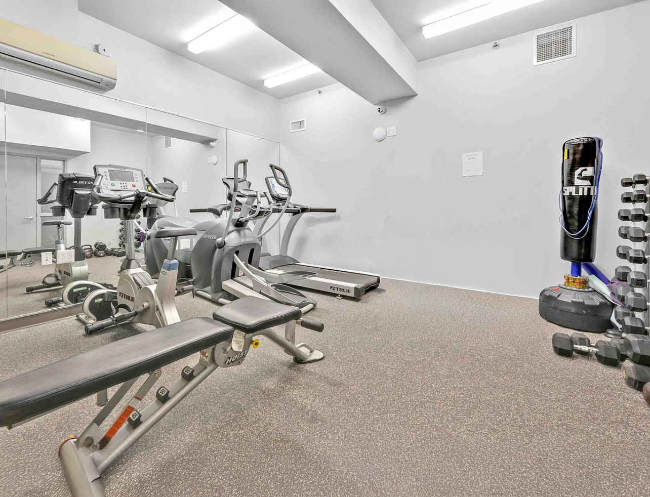 448 West 167th Street, Unit 3E Manhattan, NY 10032 - Photo 17 of 24 a view of a room with gym equipment