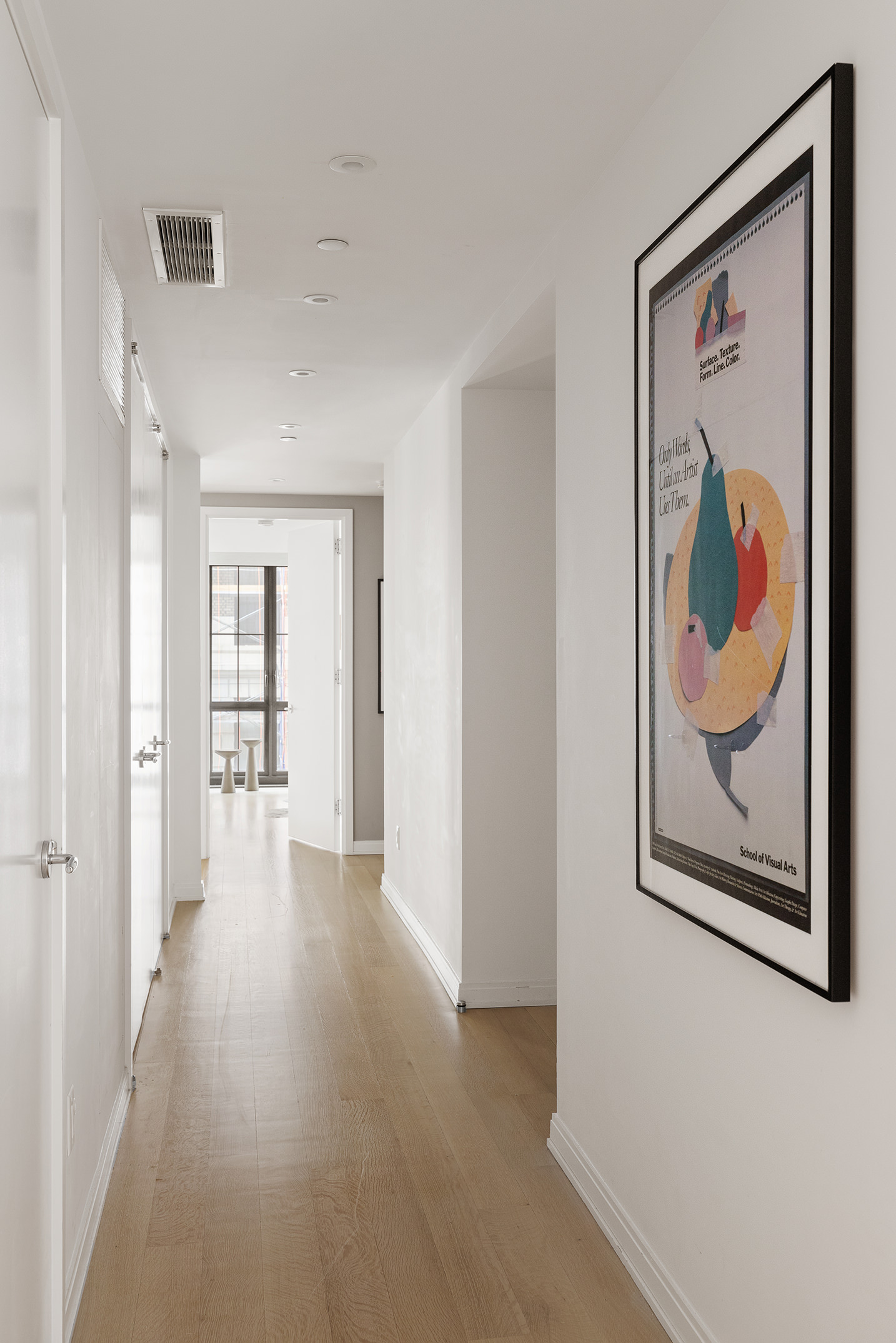 221 West 77th Street, Unit 4E Manhattan, NY 10024 - Photo 8 of 20 a view of a hallway with a painting on the wall
