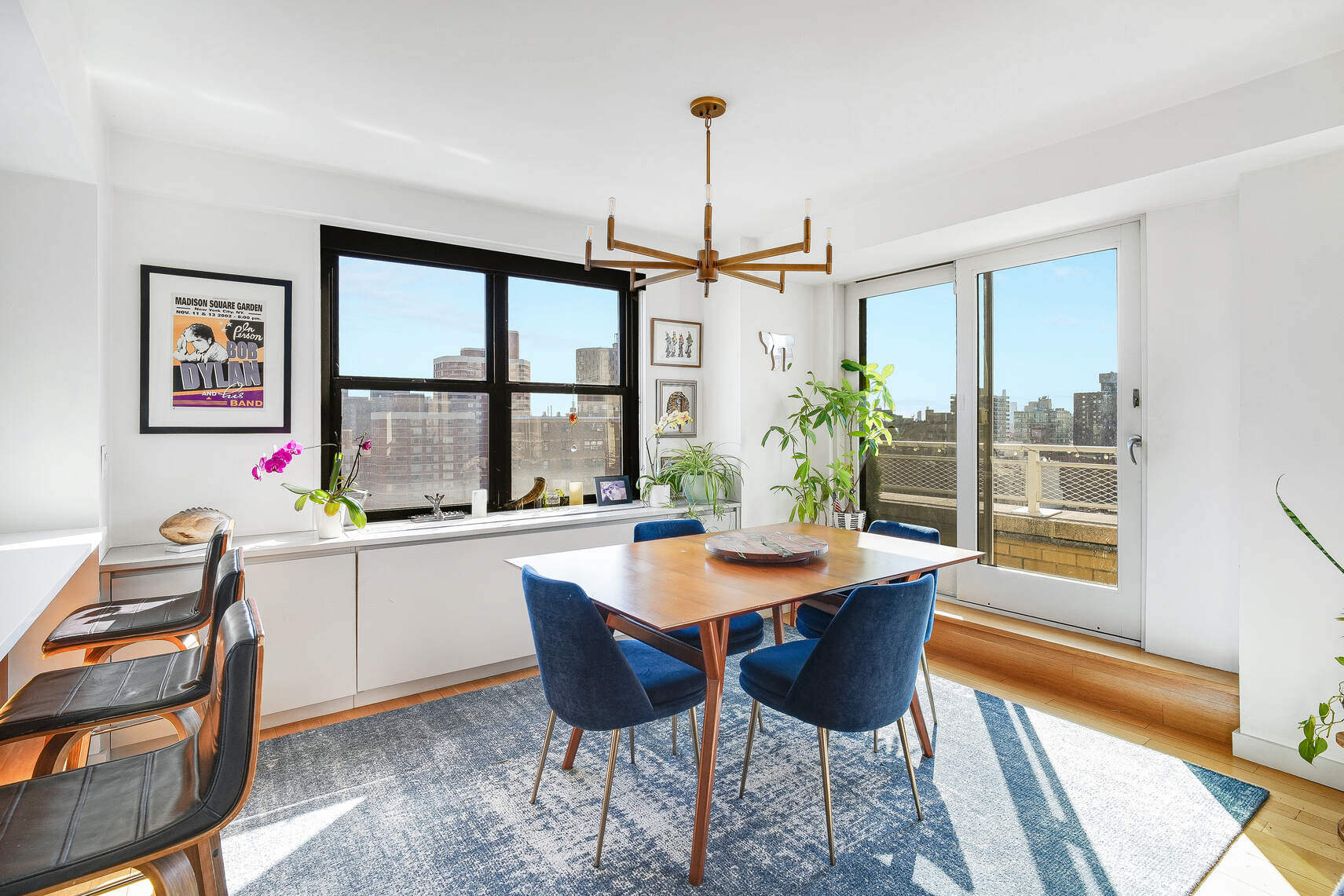 201 East 28th Street, Unit 21BC Manhattan, NY 10016 - Photo 4 of 24 a view of a dining room with furniture window and outside view