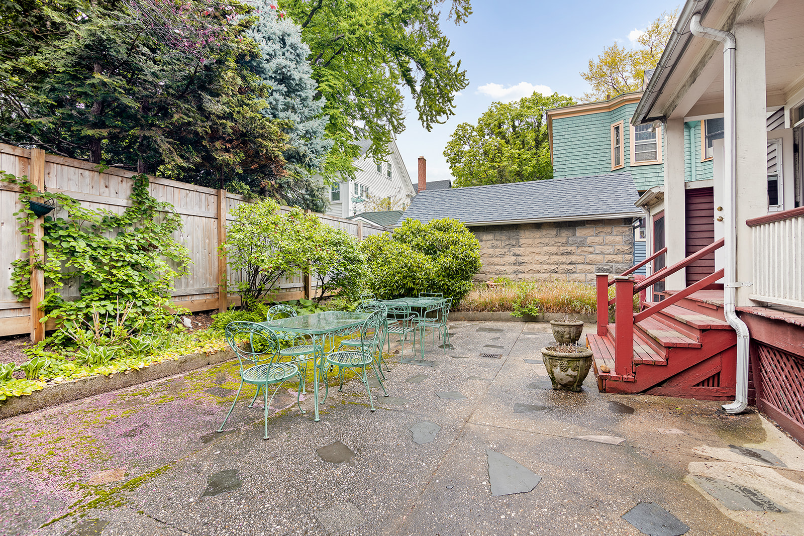 196 Marlborough Road Brooklyn, NY 11226 - Photo 22 of 23 a view of a chair and table in backyard of the house