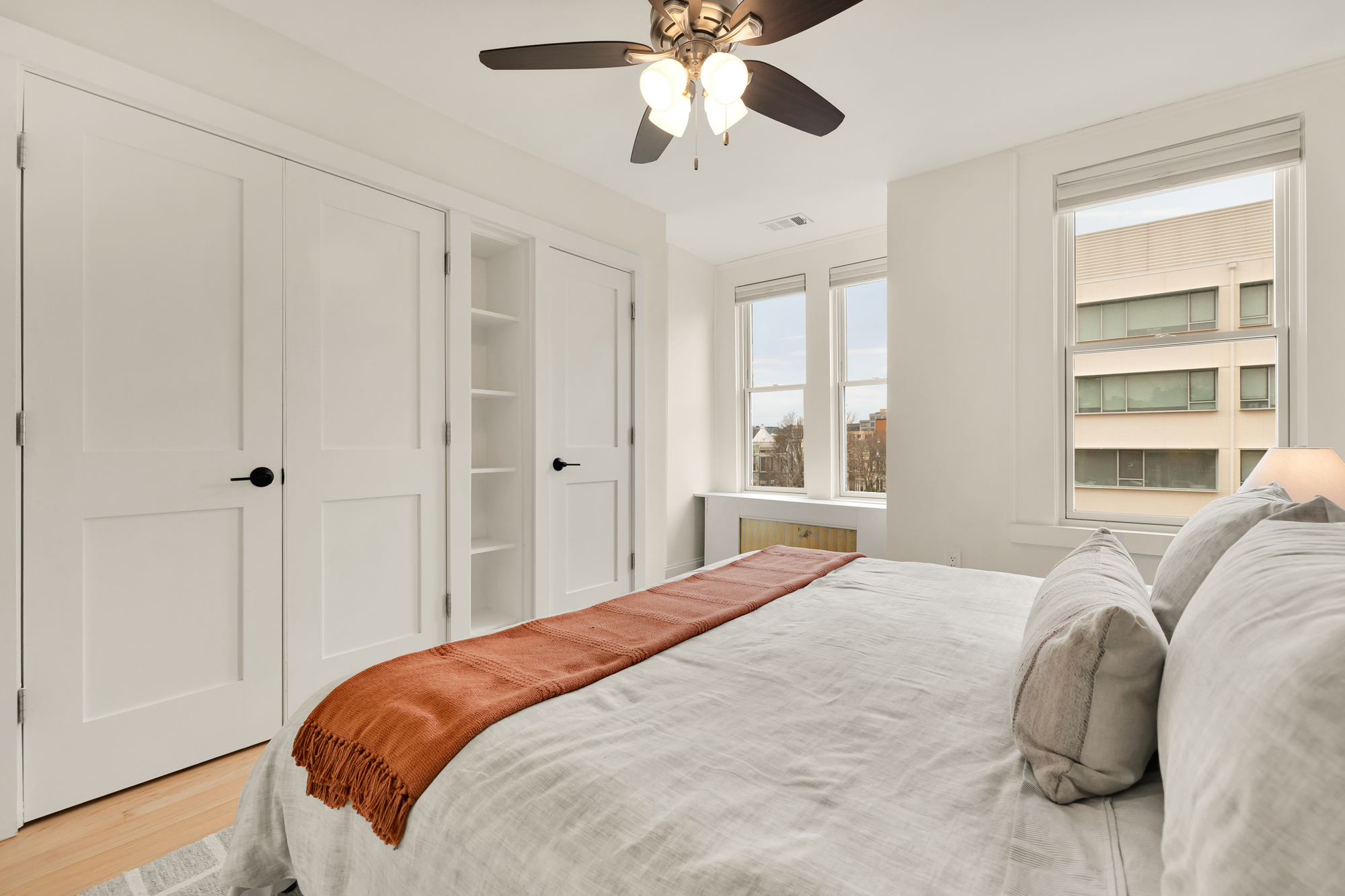 903 F Street Northeast Washington, DC 20002 - Photo 18 of 41 a bedroom with a bed and a window