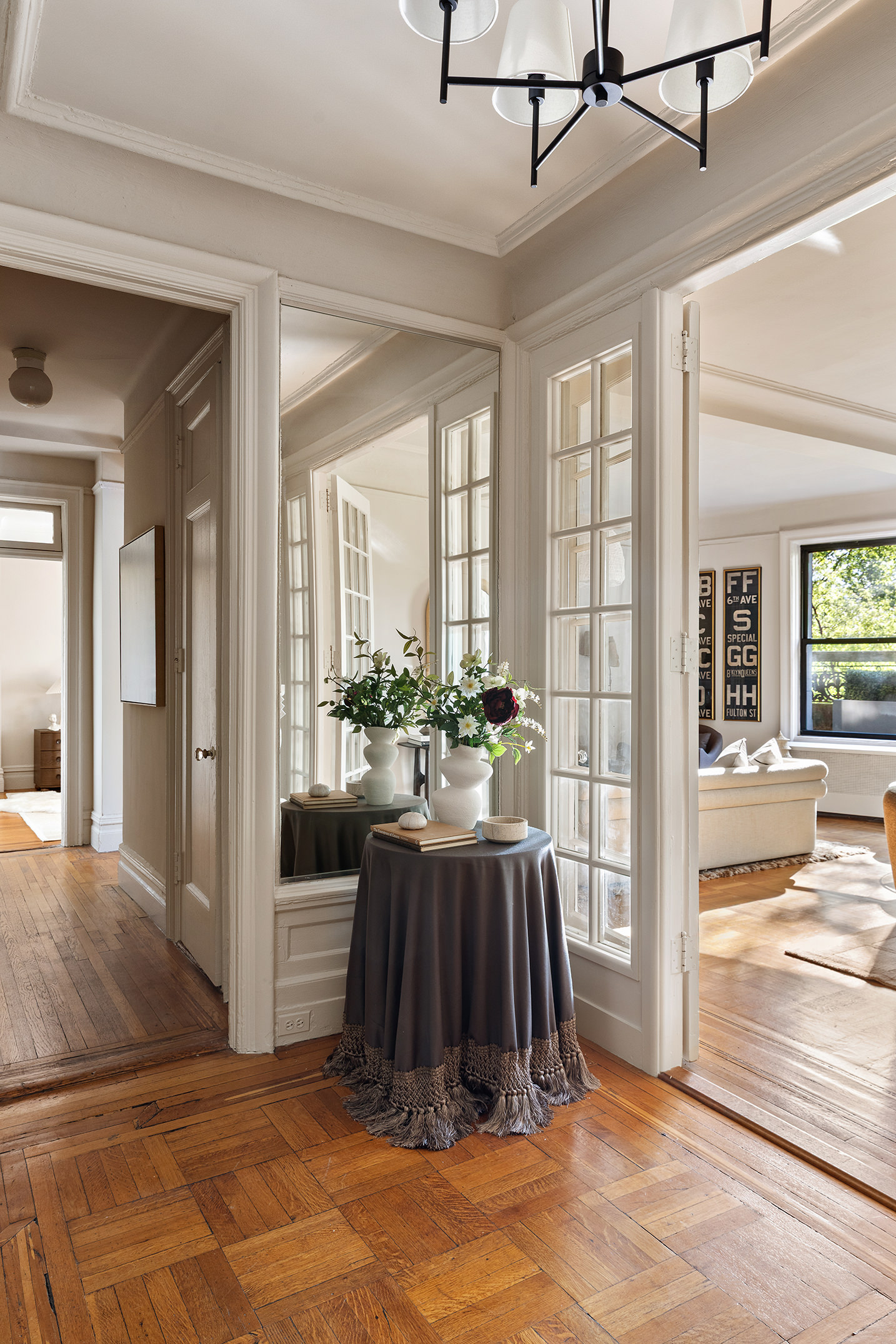 270 Riverside Drive, Unit 2C Manhattan, NY 10025 - Photo 6 of 22 a view of a livingroom with furniture and front door
