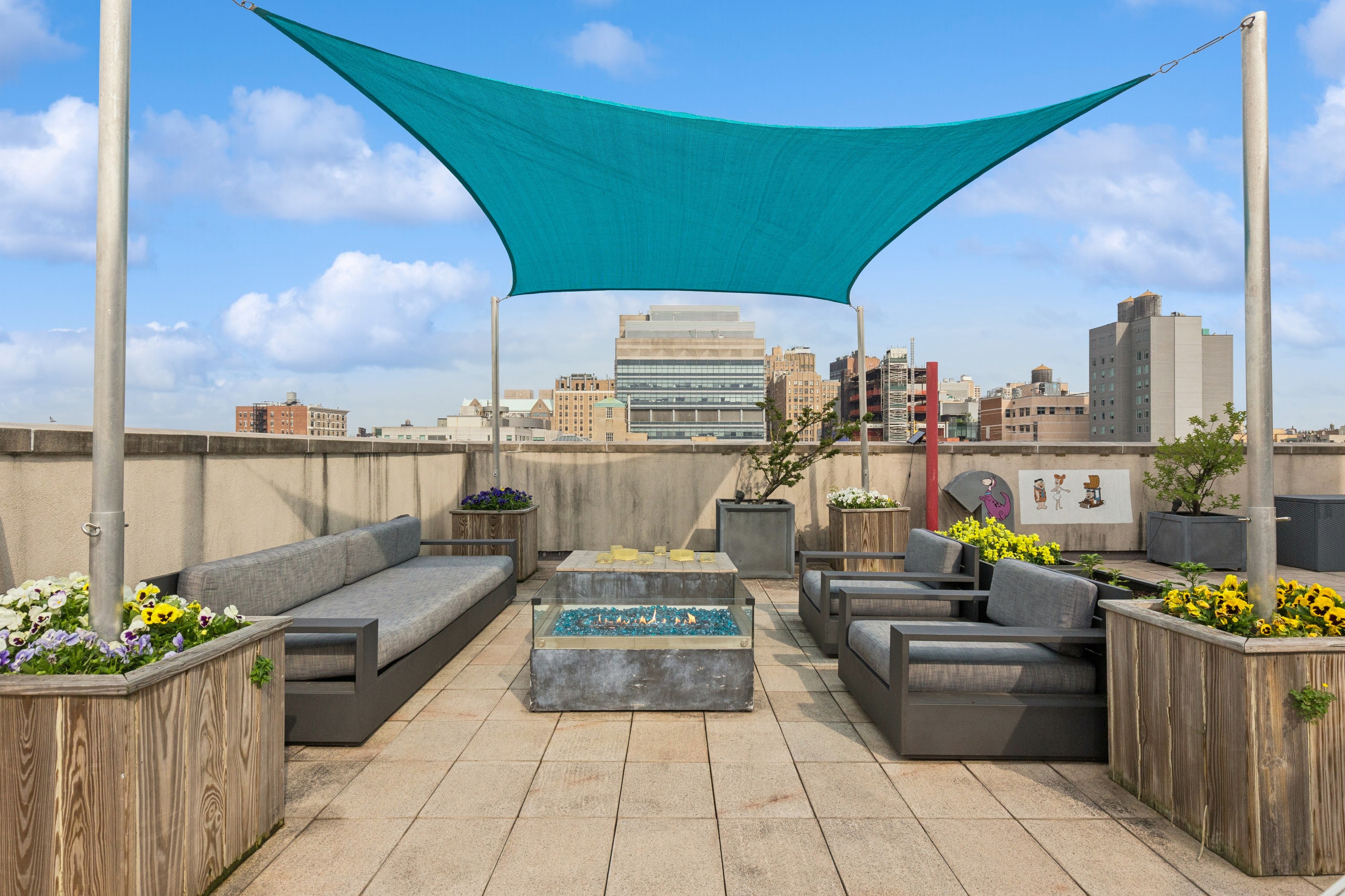 a view of roof deck with seating space