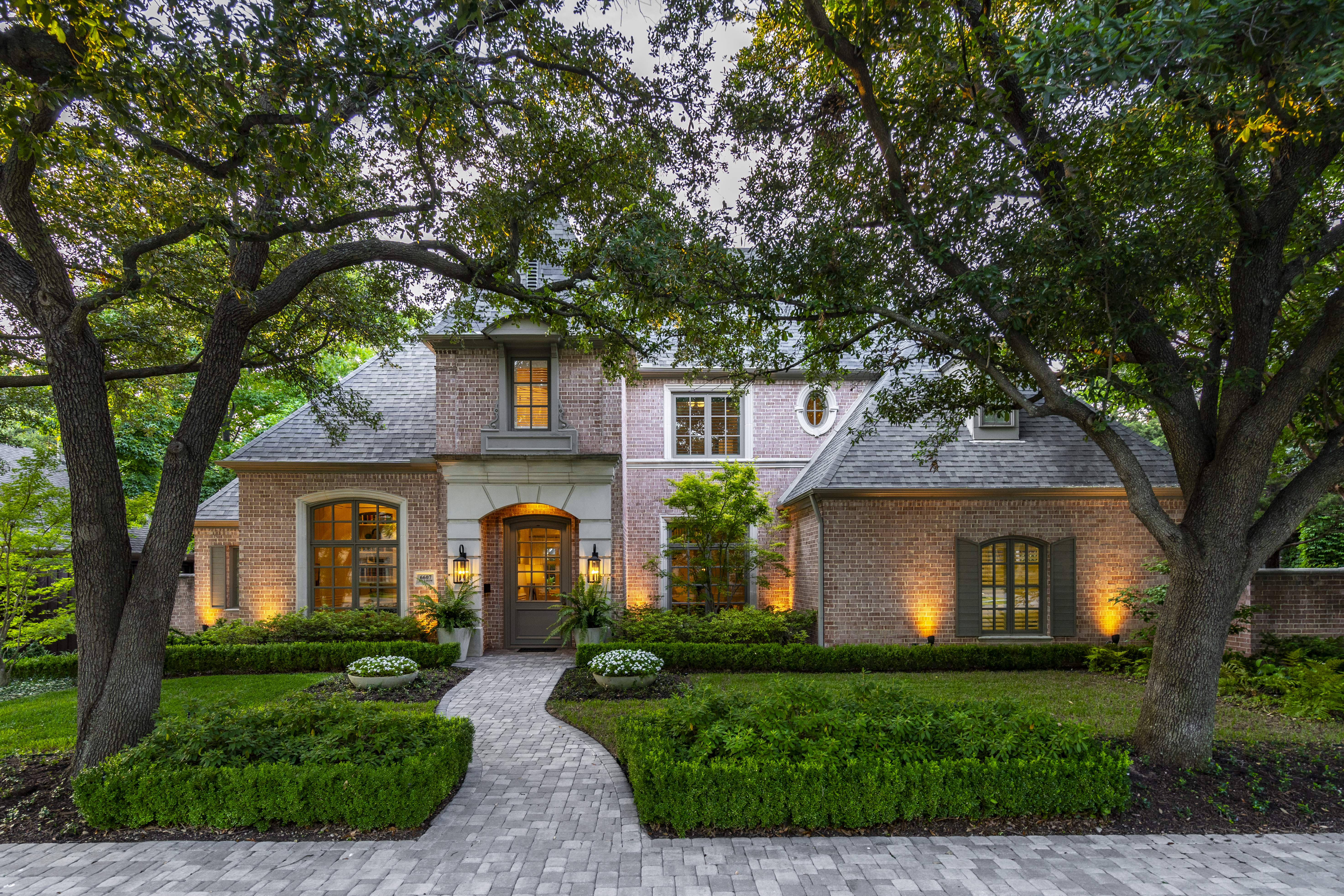 front view of a house with a yard