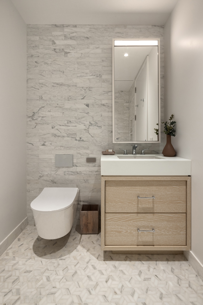 250 West 96th Street, Unit 7D Manhattan, NY 10025 - Photo 9 of 28 a bathroom with a sink toilet and mirror