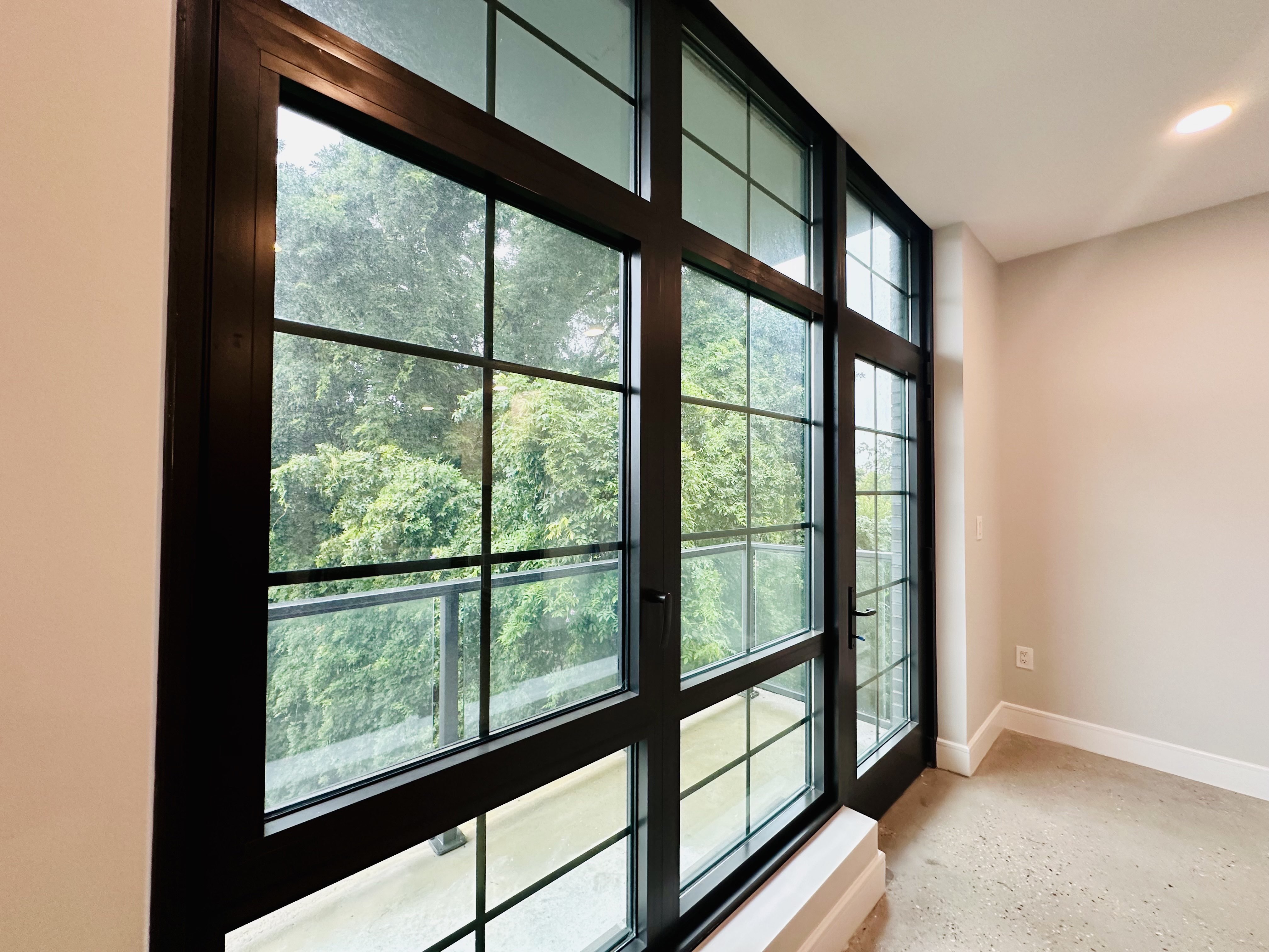 23 Bleecker Street, Unit 4E Brooklyn, NY 11221 - Photo 6 of 11 a view of a large window with an outdoor space