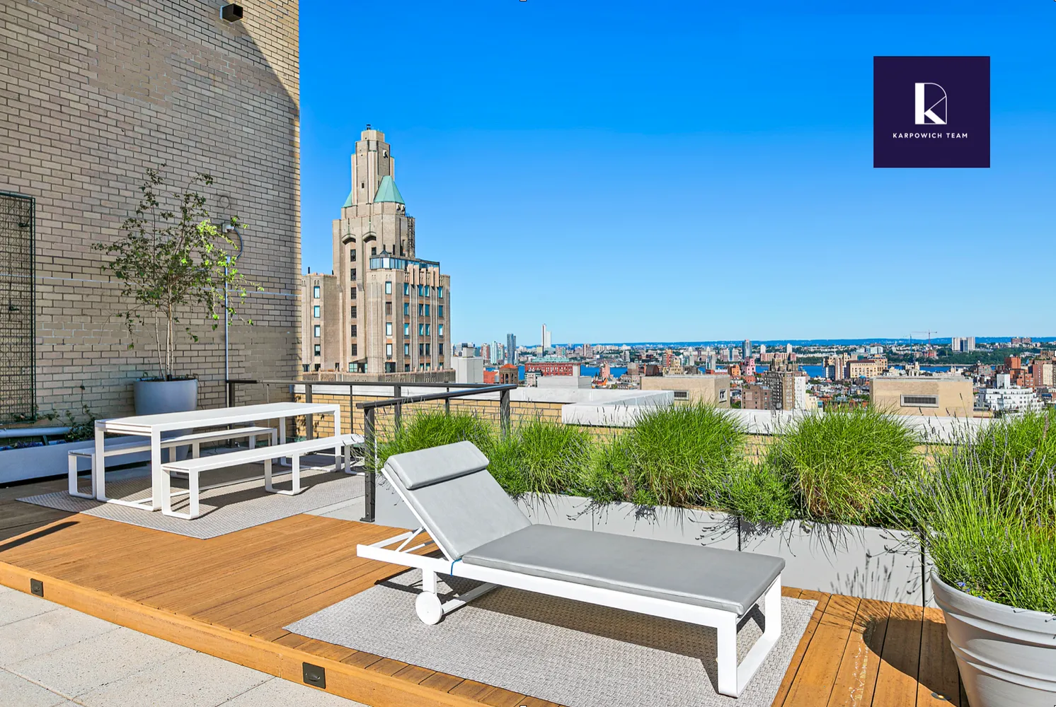 a terrace with a table and chairs