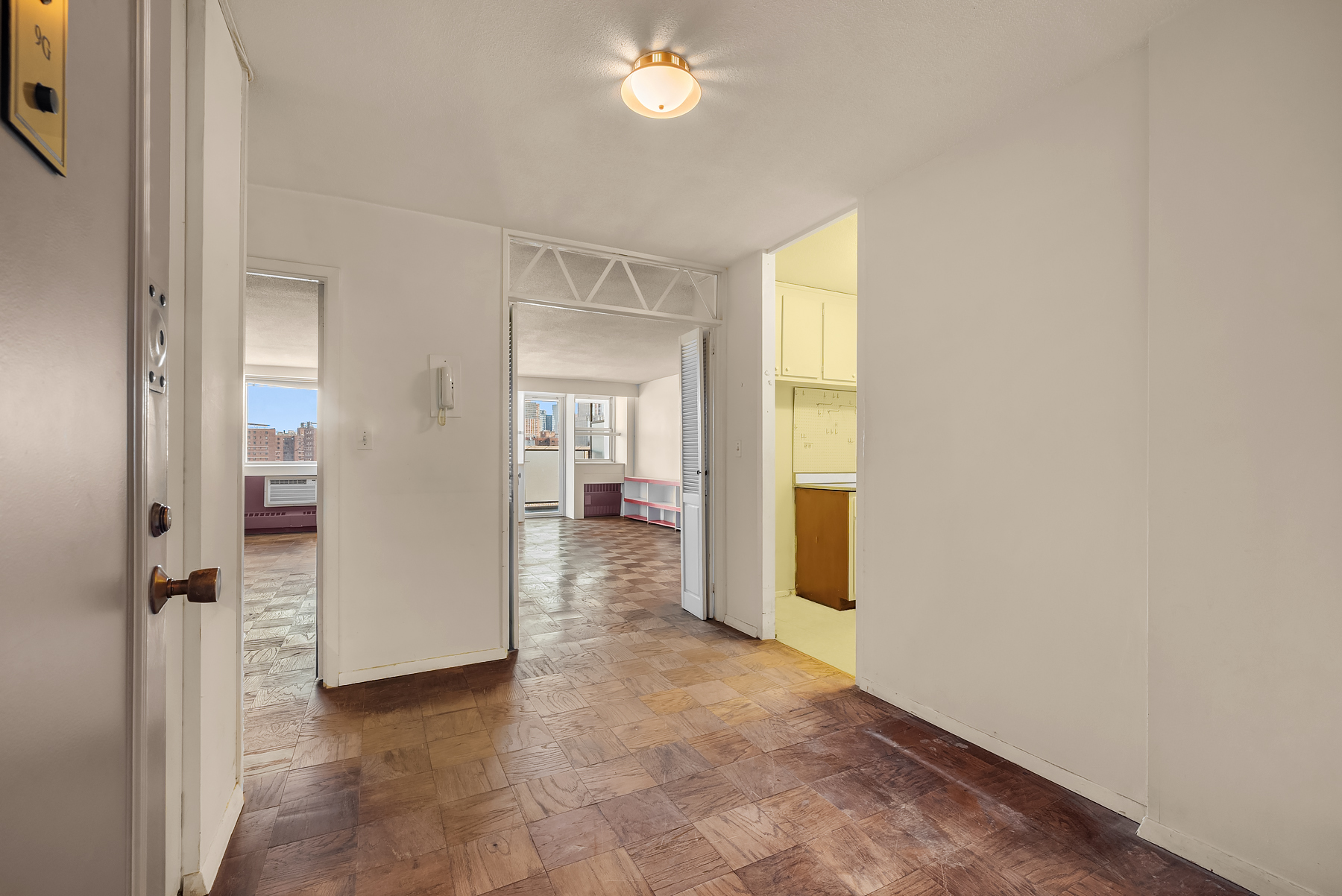 75 Henry Street, Unit 9G Brooklyn, NY 11201 - Photo 7 of 13 an empty room with windows and closet