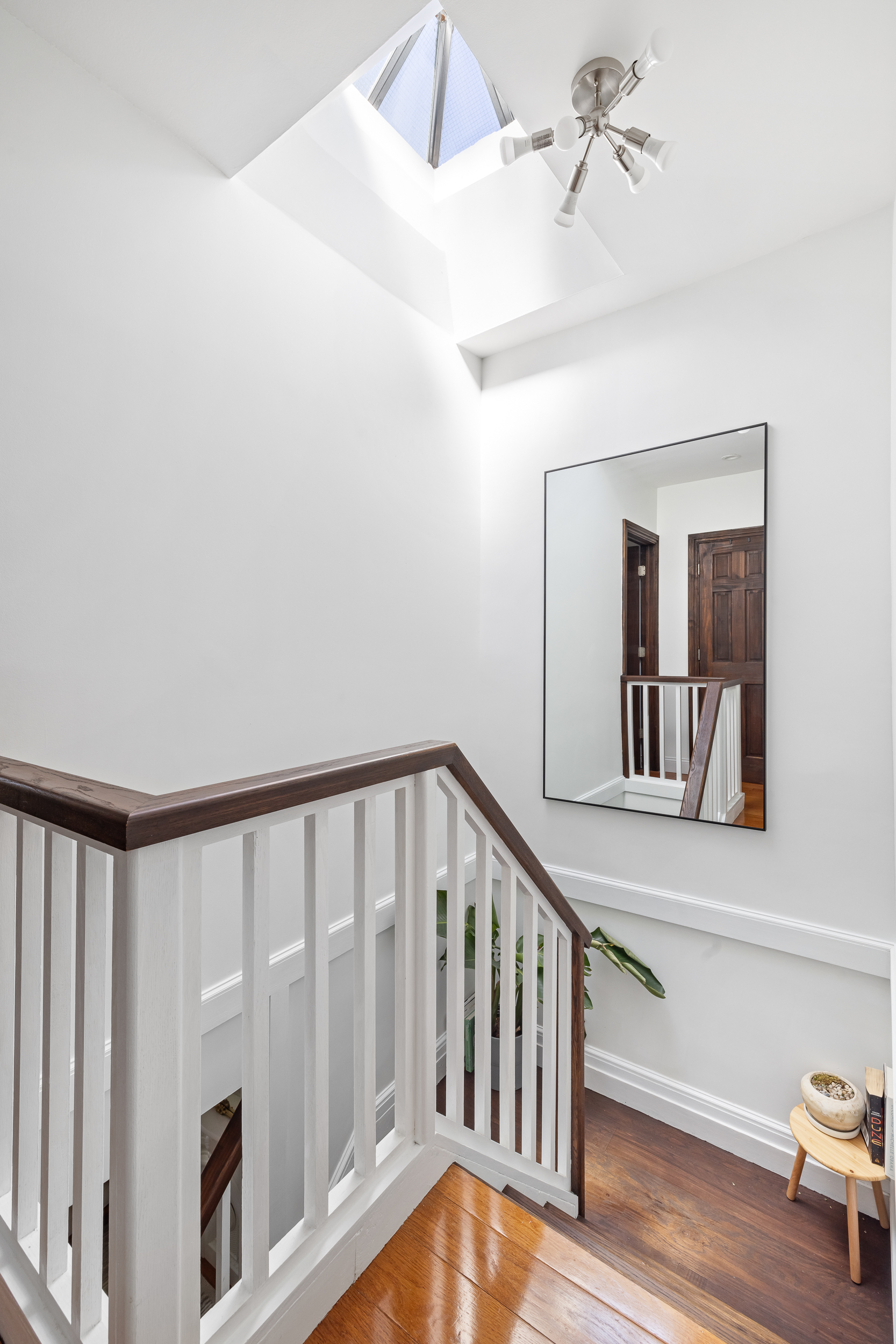 716 Monroe Street Brooklyn, NY 11221 - Photo 14 of 22 a view of a hallway with staircase