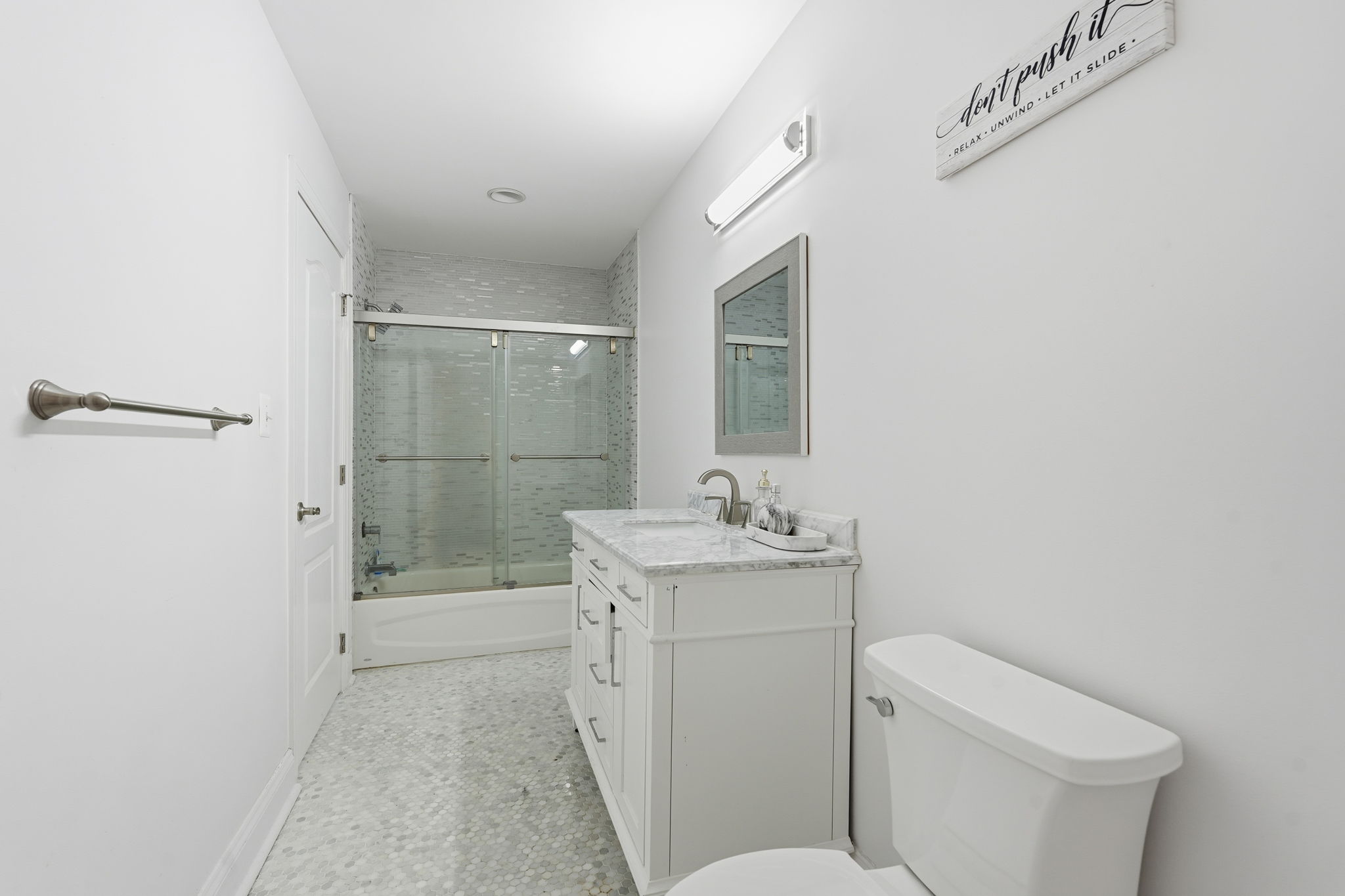 11000 Brooks Reserve Road Upper Marlboro, MD 20772 - Photo 31 of 60 a bathroom with a granite countertop sink a toilet and shower