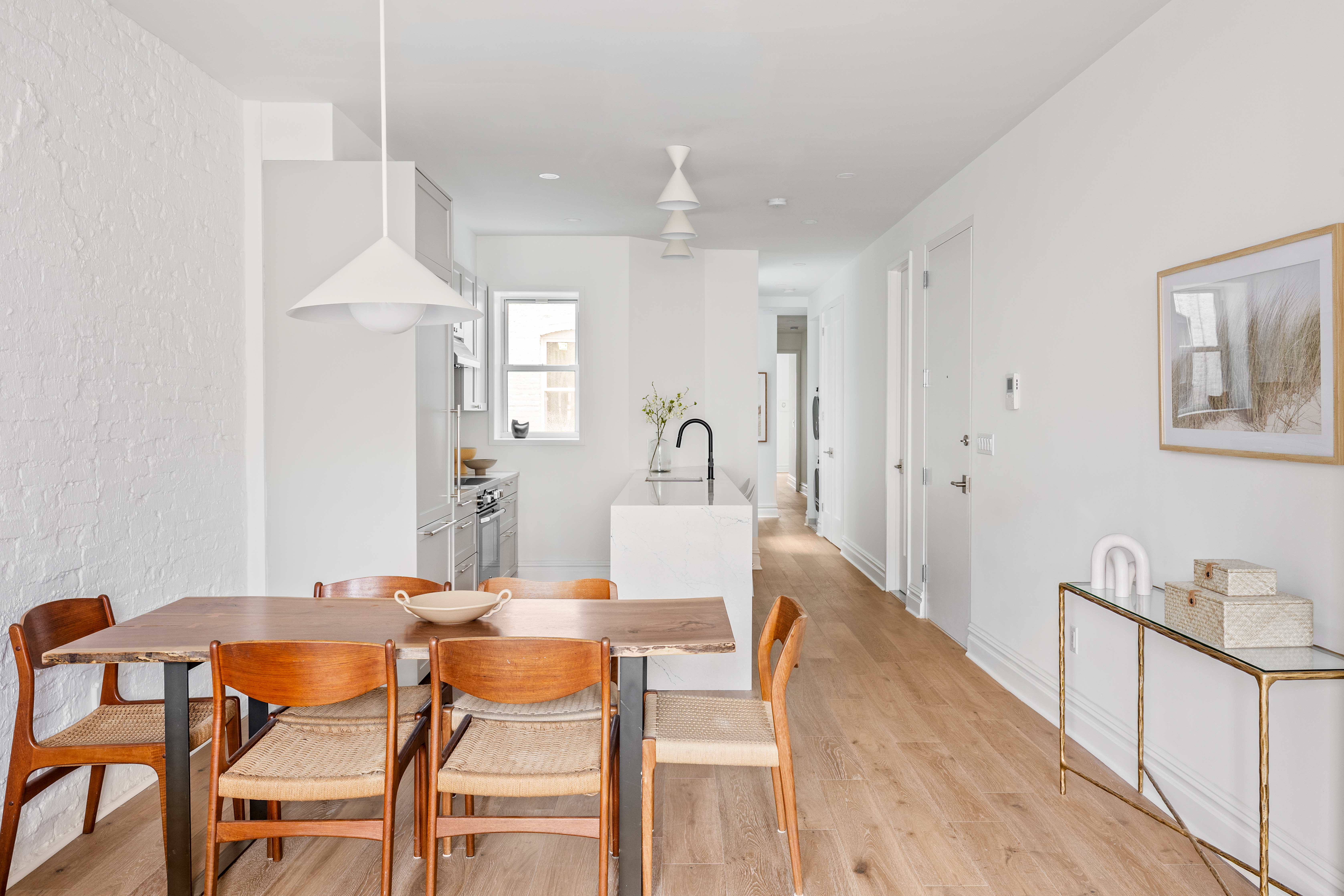 744 Park Place, Unit 3B Brooklyn, NY 11216 - Photo 3 of 10 a view of a dining room with furniture and wooden floor