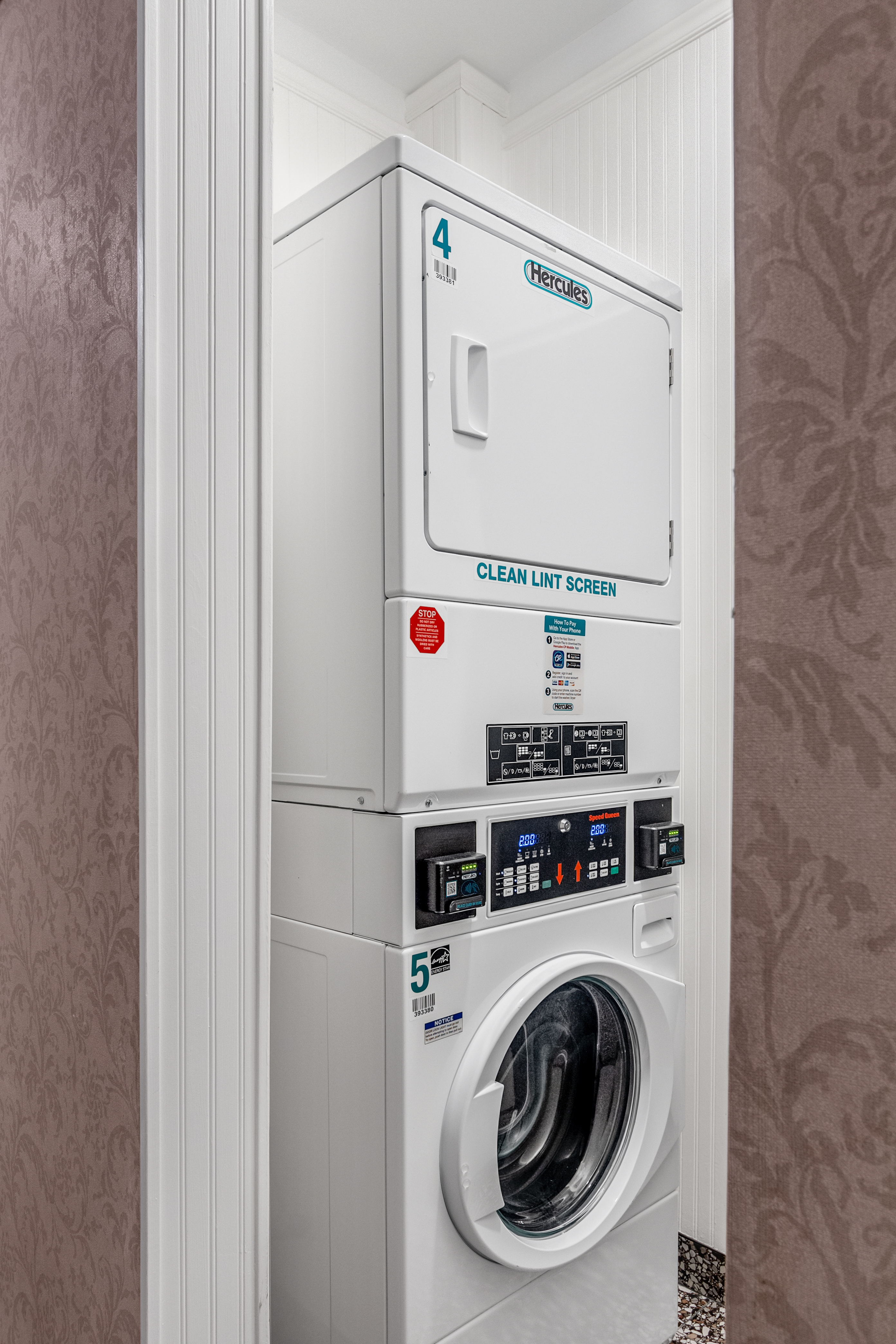 51 West 81st Street, Unit 9D Manhattan, NY 10024 - Photo 10 of 15 a utility room with dryer and washer