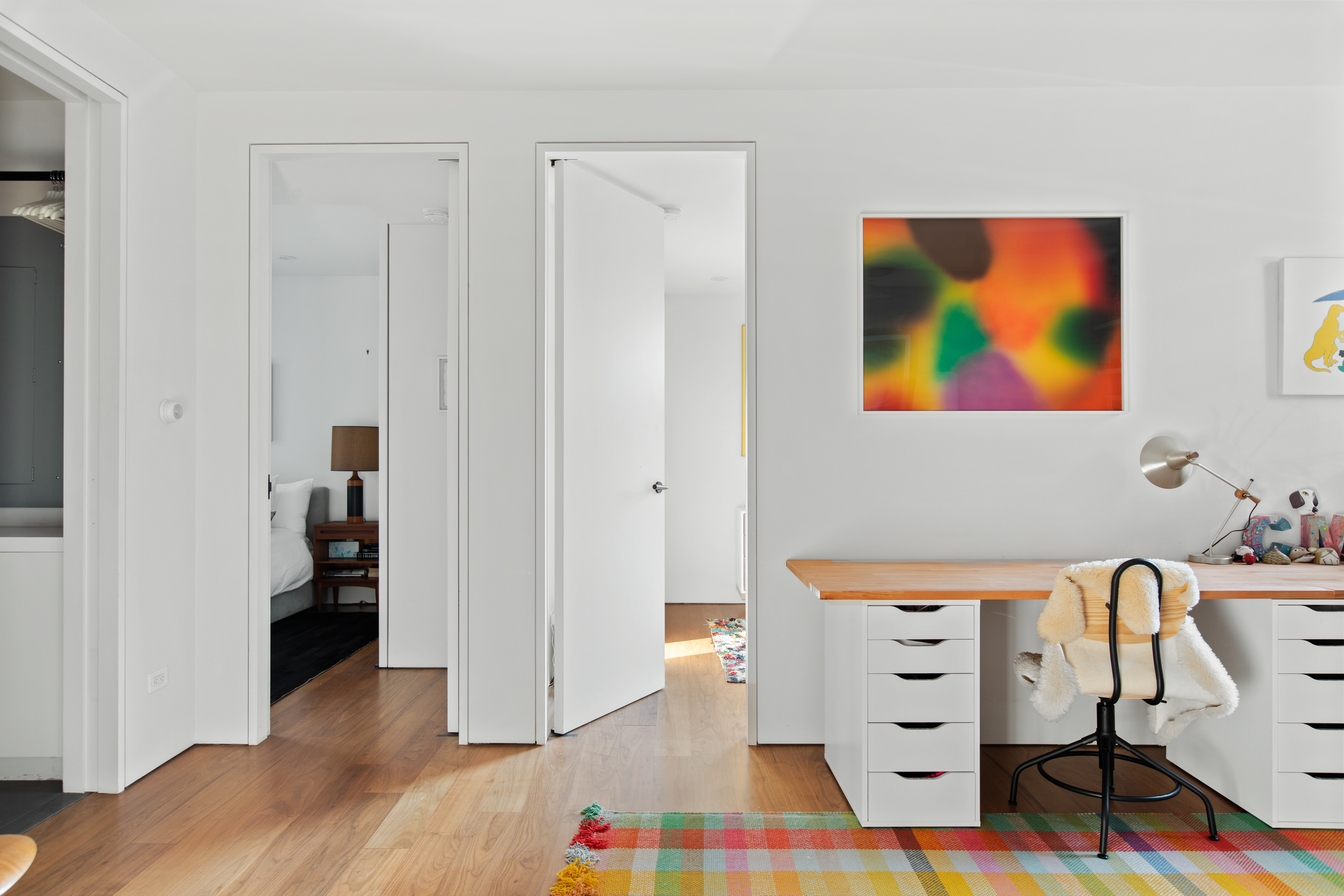 440 Van Brunt Street Brooklyn, NY 11231 - Photo 20 of 33 a view of a bedroom with baby crib and wooden floor