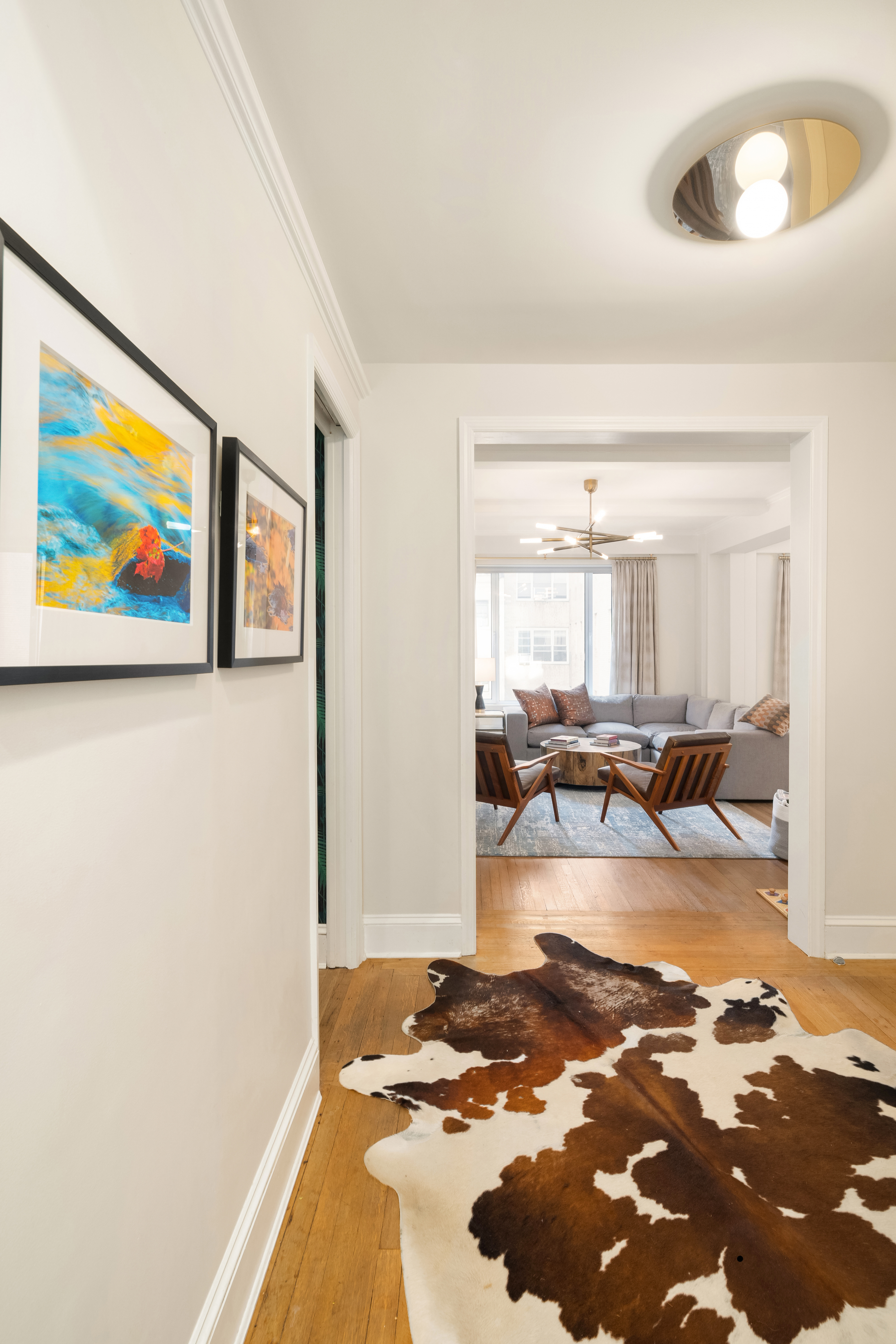 138 East 36th Street, Unit 4C Manhattan, NY 10016 - Photo 15 of 17 a view of a living room with a rug