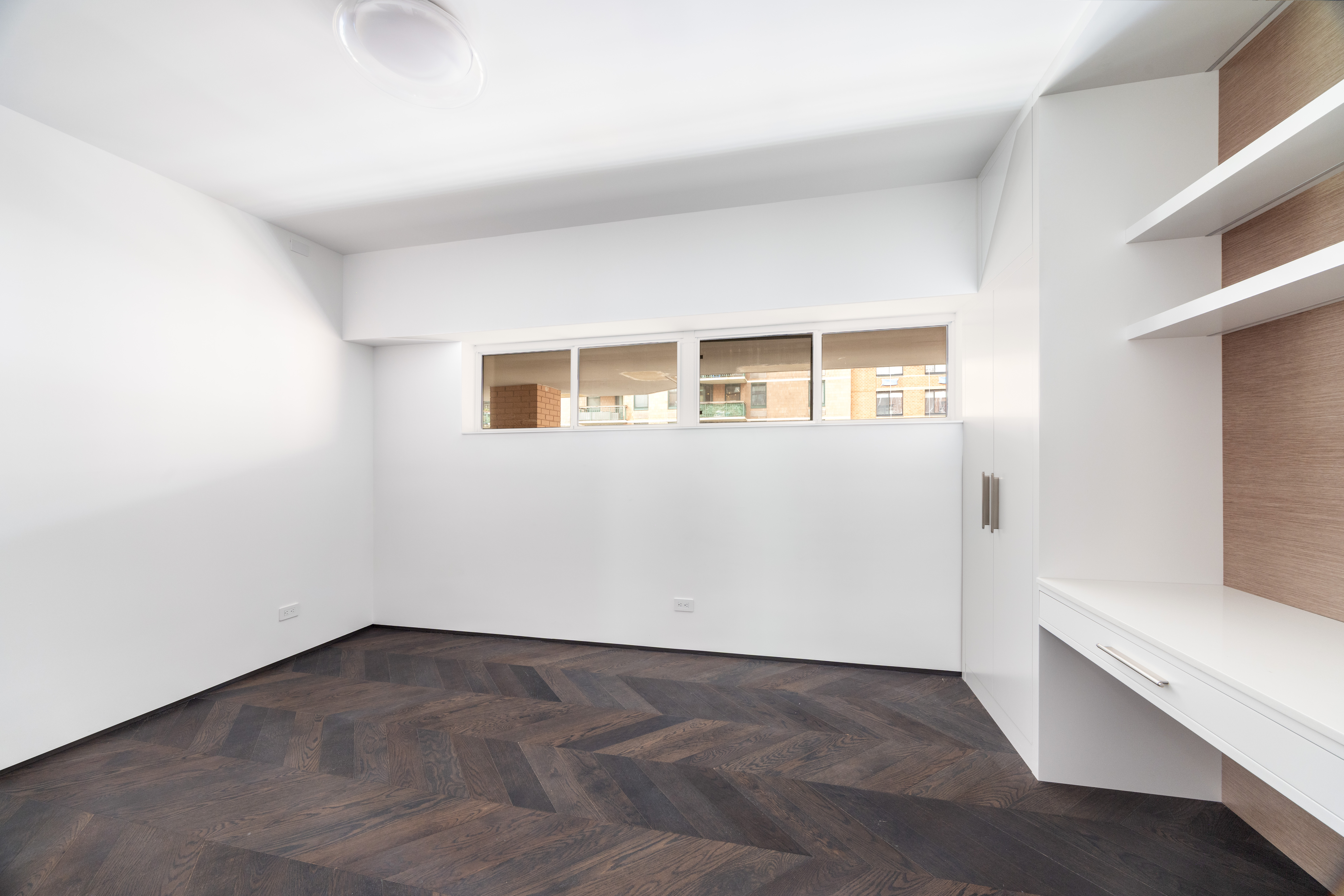 340 Albany Street Manhattan, NY 10280 - Photo 21 of 24 an empty room with a window