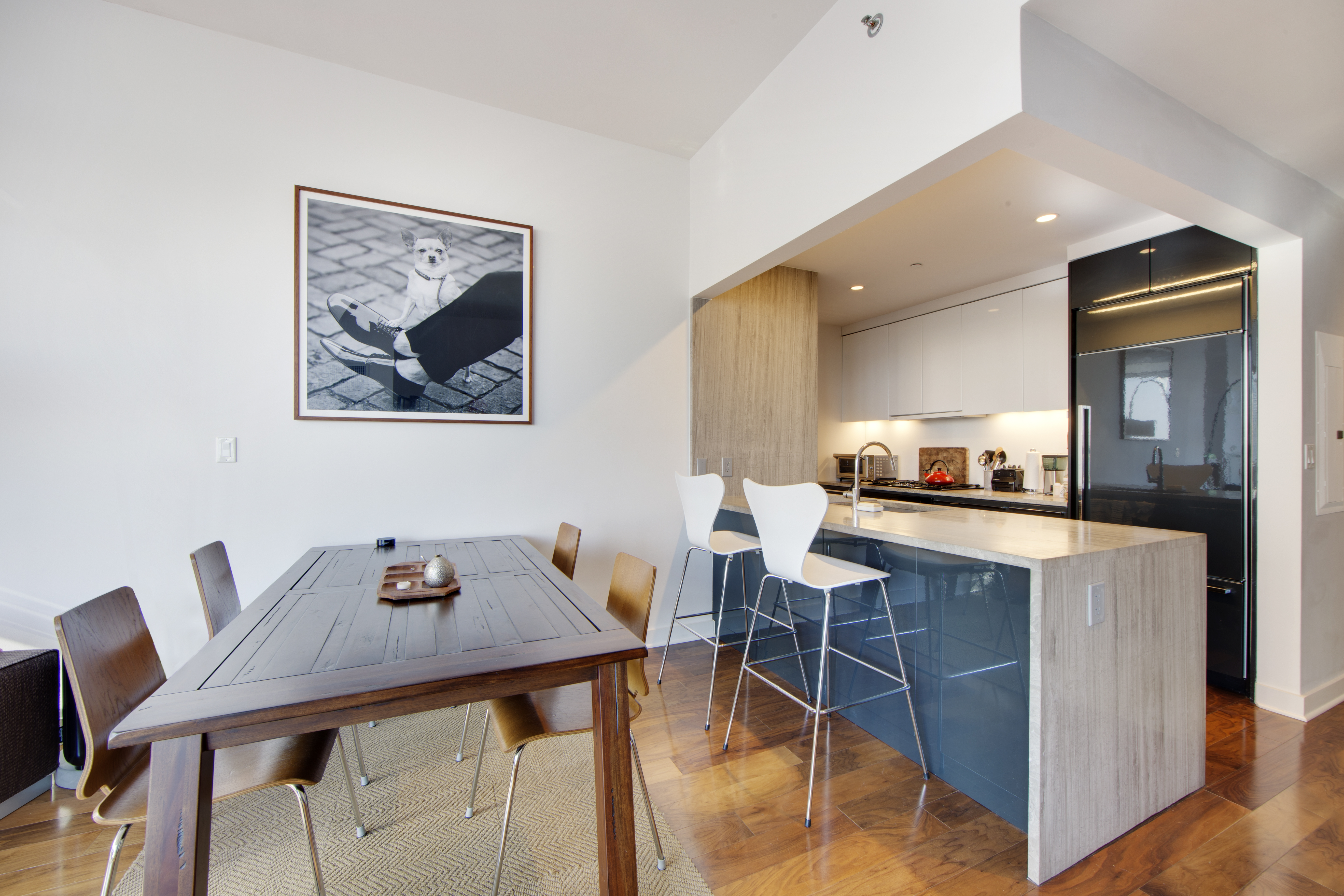 2 Northside Piers, Unit 2O Brooklyn, NY 11249 - Photo 3 of 7 a view of a dining room with furniture