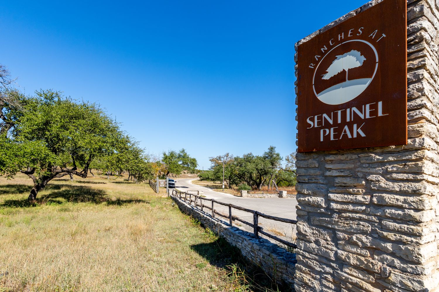 a view of lake with green space