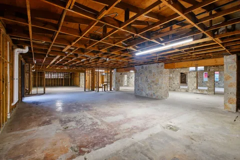 a view of large room with wooden walls