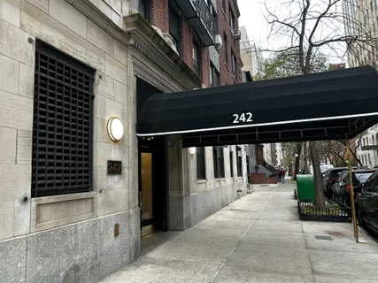 a view of porch with a bench