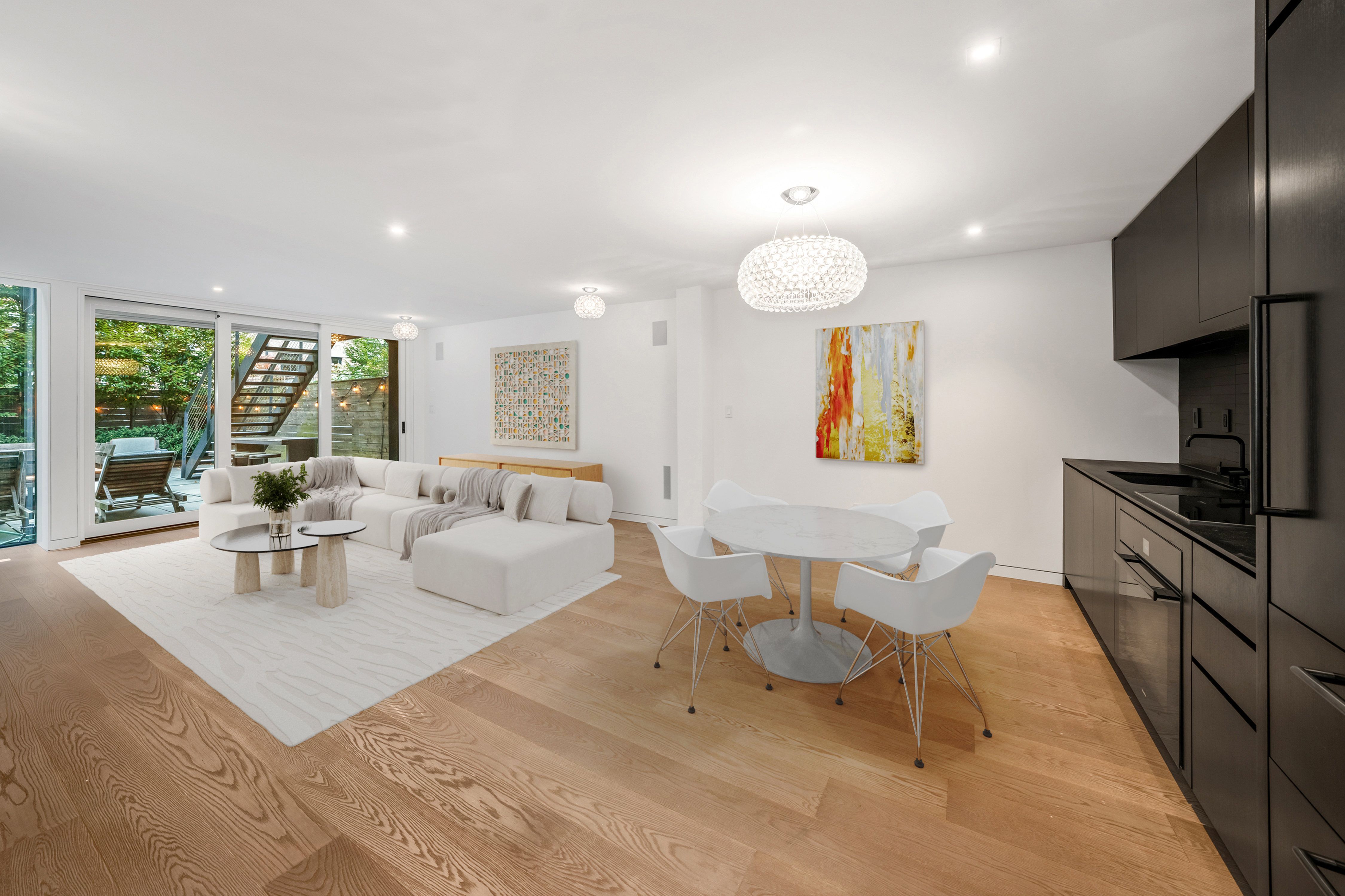 369 Union Street Brooklyn, NY 11231 - Photo 13 of 21 a living room with furniture a large window and stainless steel appliances