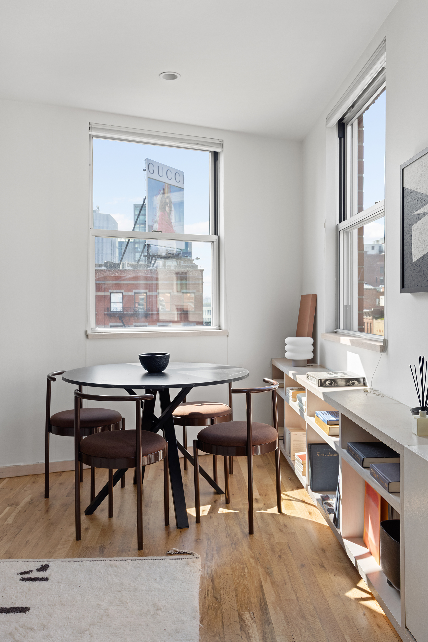 350 West 14th Street, Unit 6D Manhattan, NY 10014 - Photo 4 of 16 a view of a dining room with furniture and a window