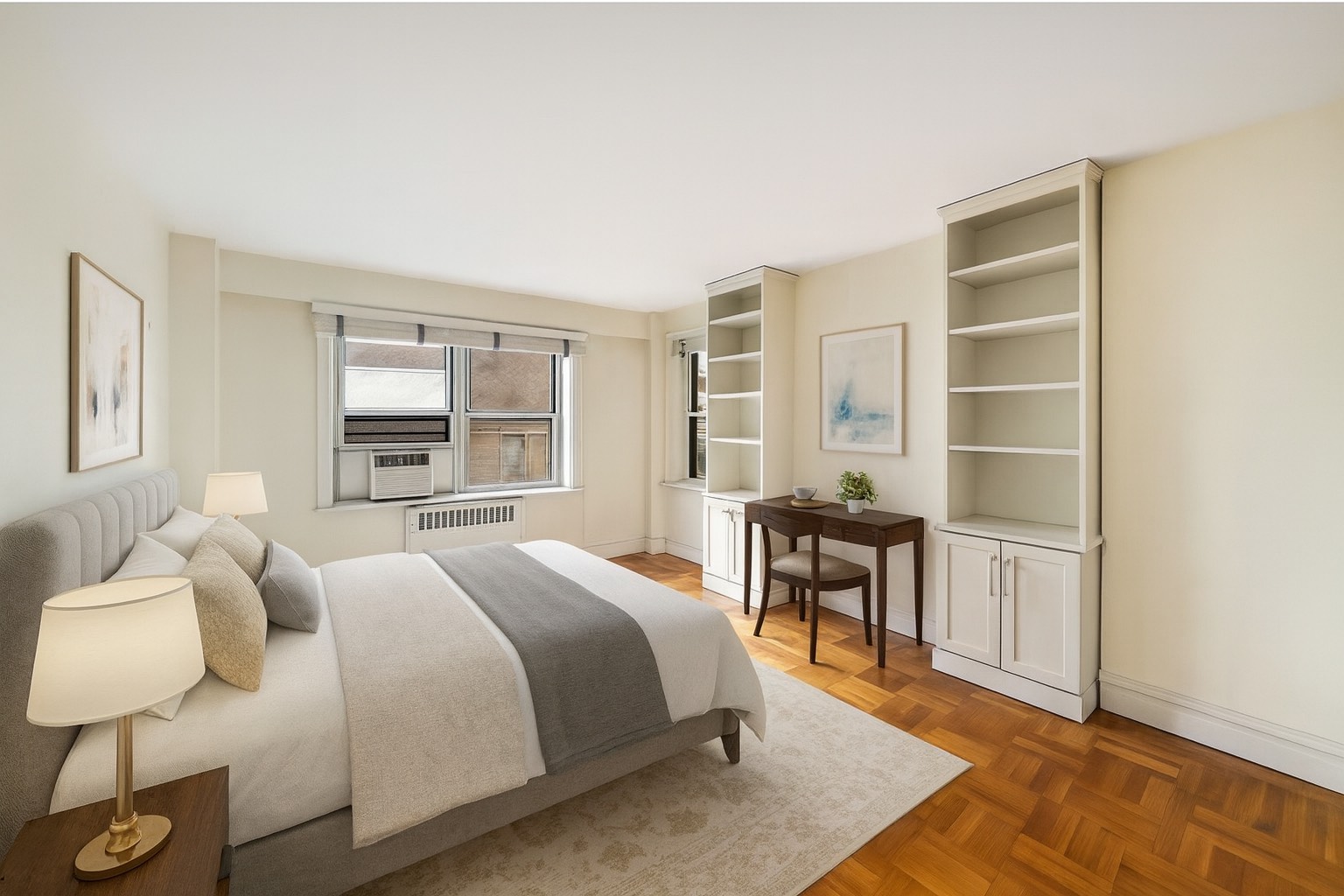 50 Sutton Place South, Unit 21L Manhattan, NY 10022 - Photo 6 of 12 a bedroom with a bed and wooden floor