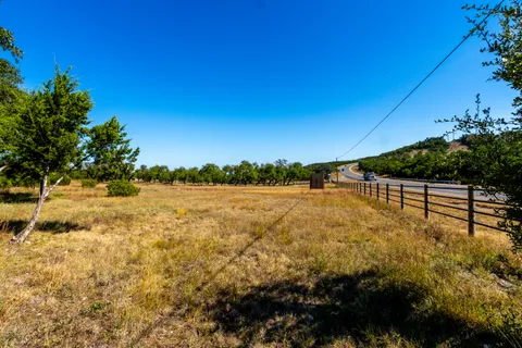 a view of lake with sunset