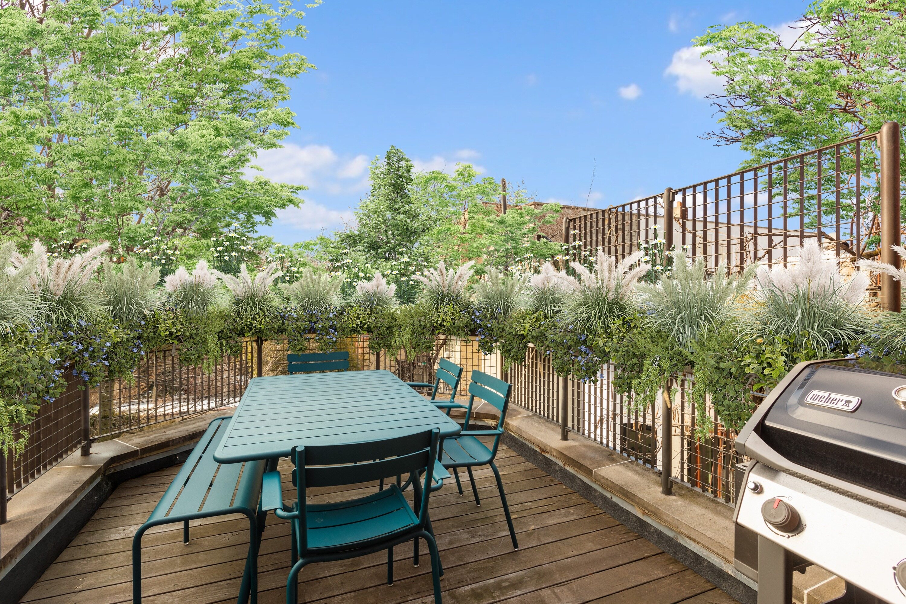 152 Underhill Avenue Brooklyn, NY 11238 - Photo 7 of 20 a view of a chairs and table on the deck
